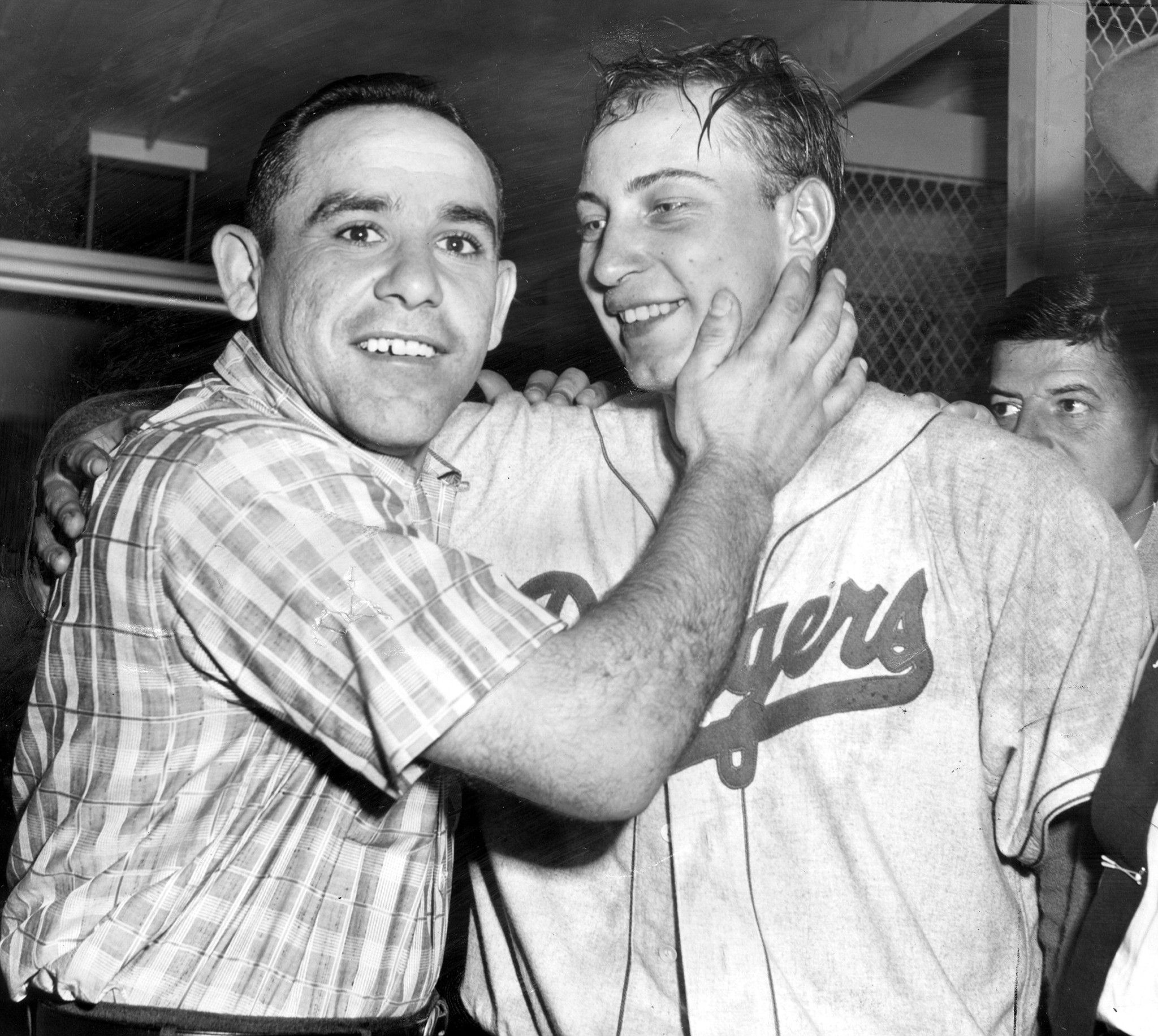Yogi Berra hugging Johnny Podres