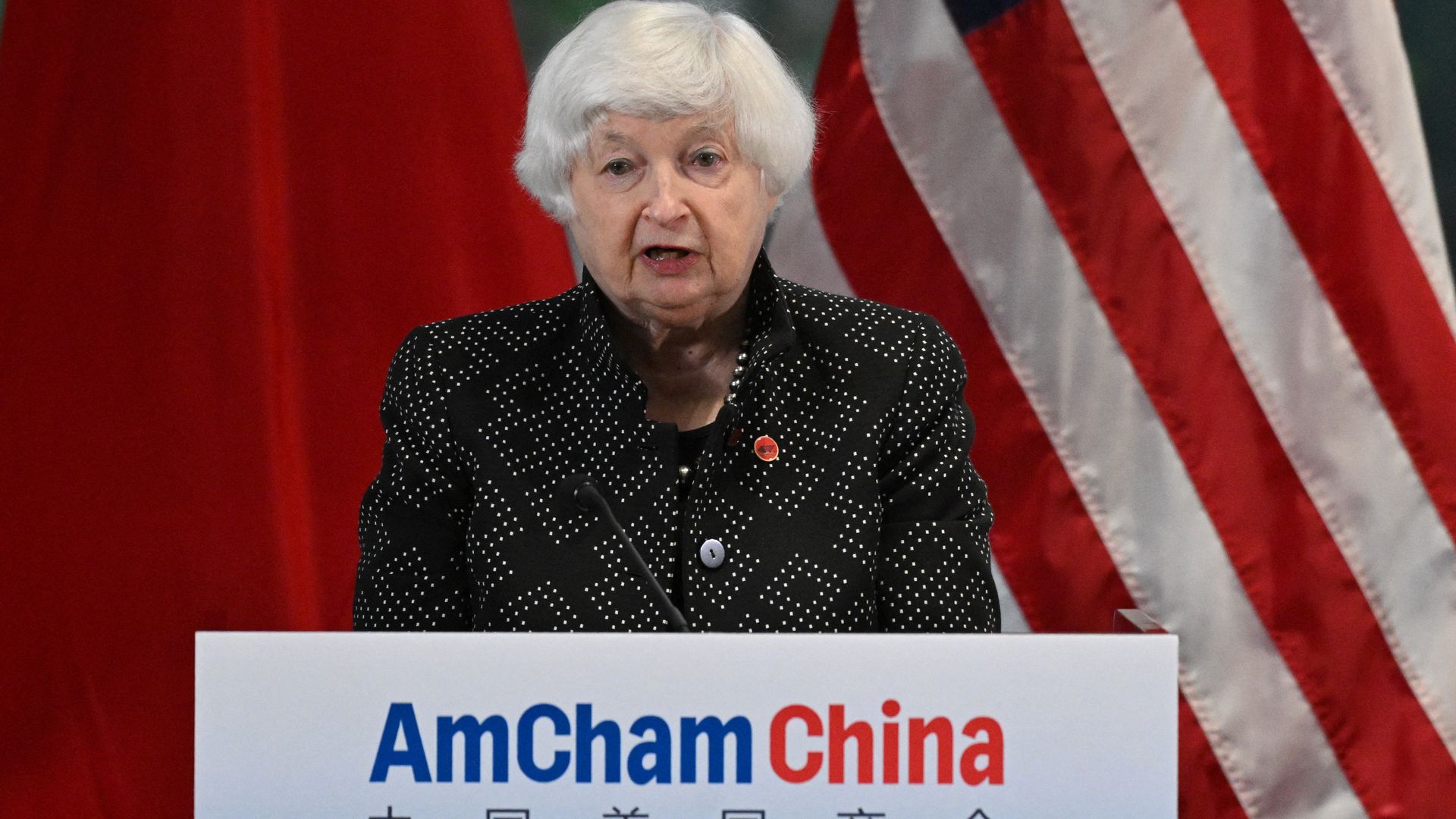 Yellen in China speaks at a podium