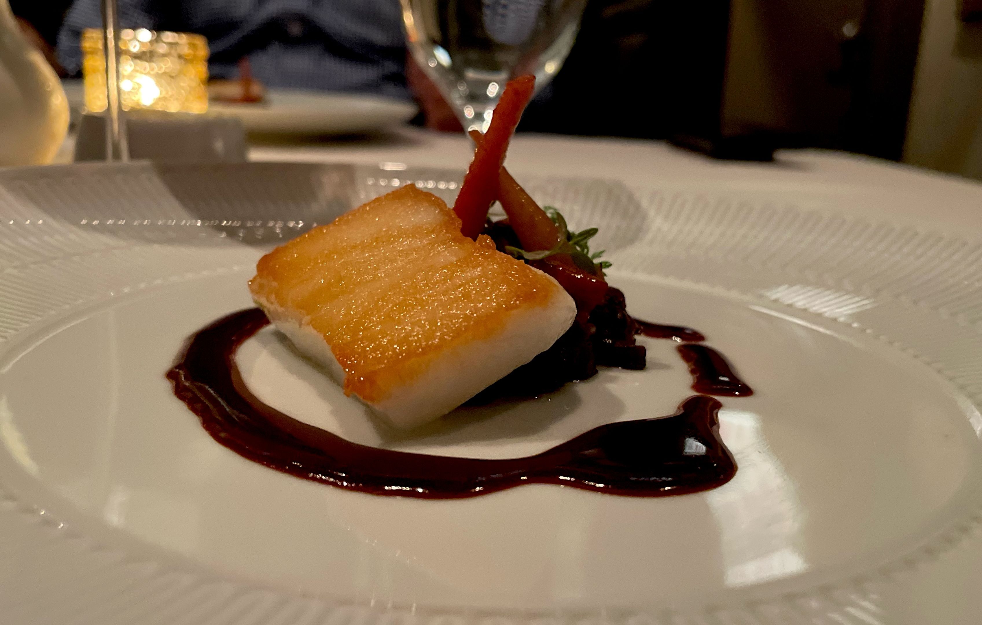 sea bass fillet in brown sauce 