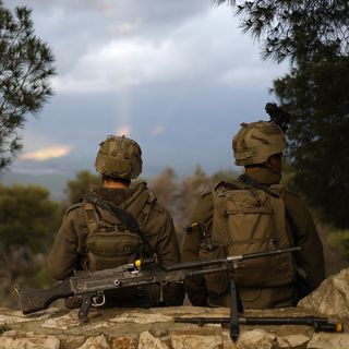 Israel planning massive ground invasion of Lebanon, officials say