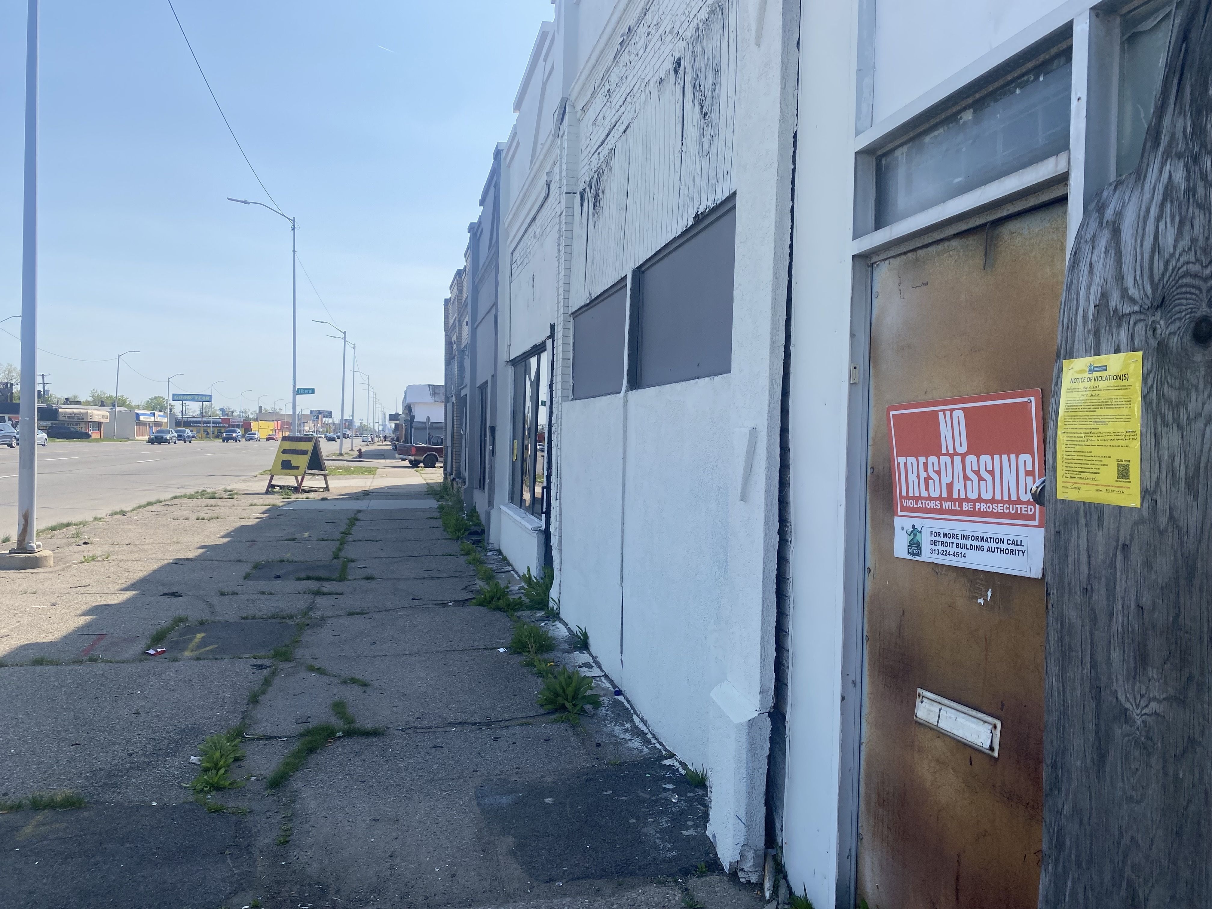 A vacant building along Gratiot is shown with a "no trespassing" sign. 