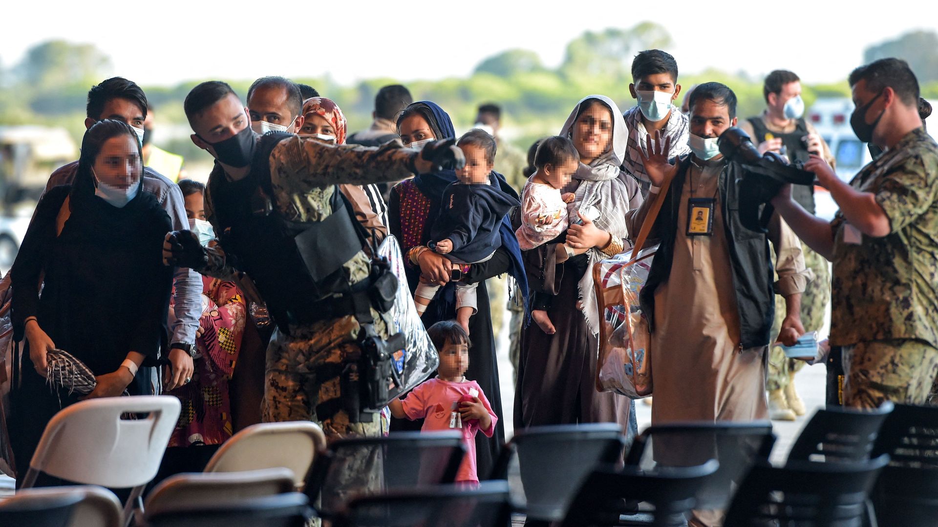 US navy soldiers helping evacuate Afghans