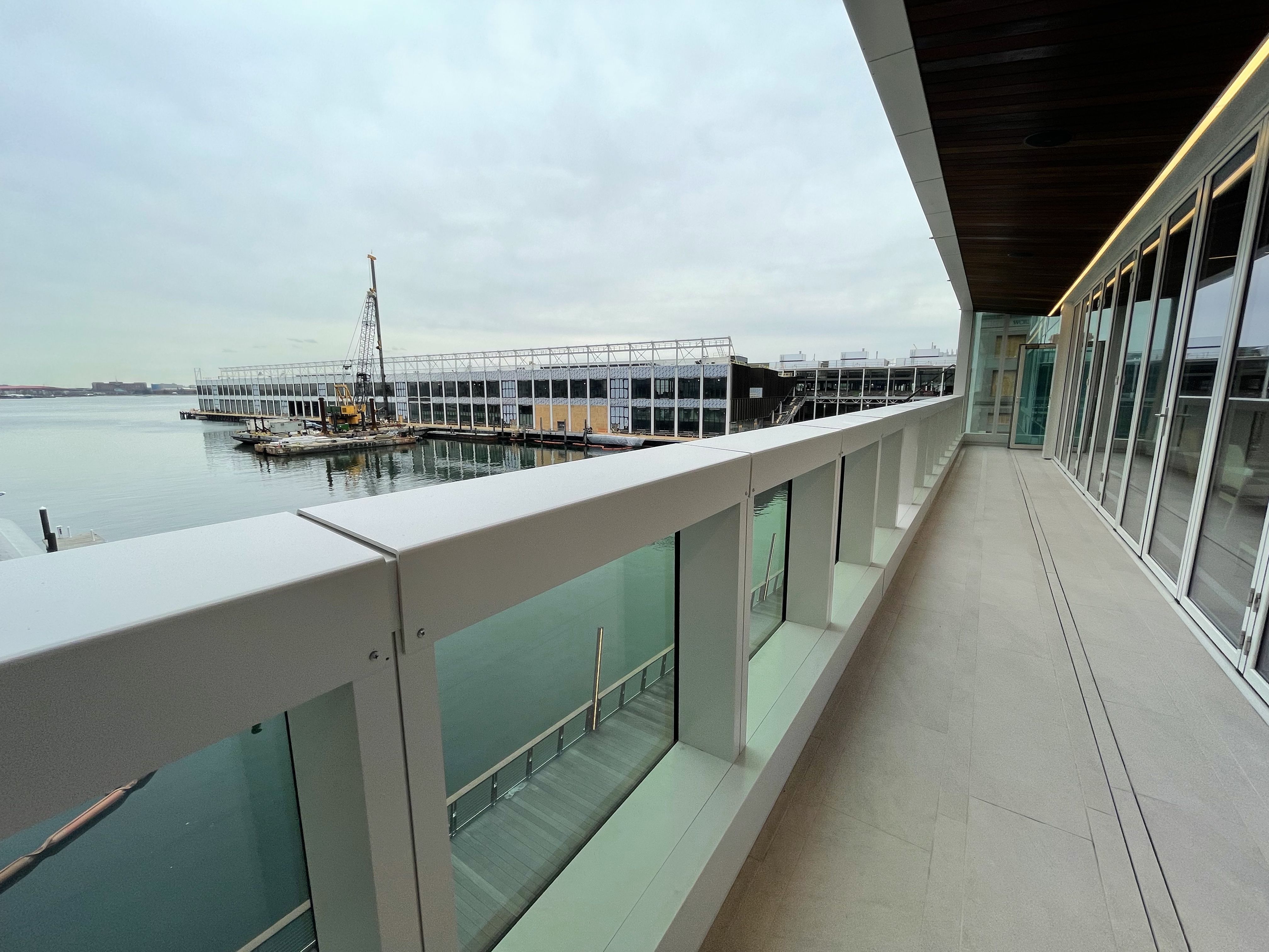 The balcony on the fourth floor of St. Regis residences with views of the water. 