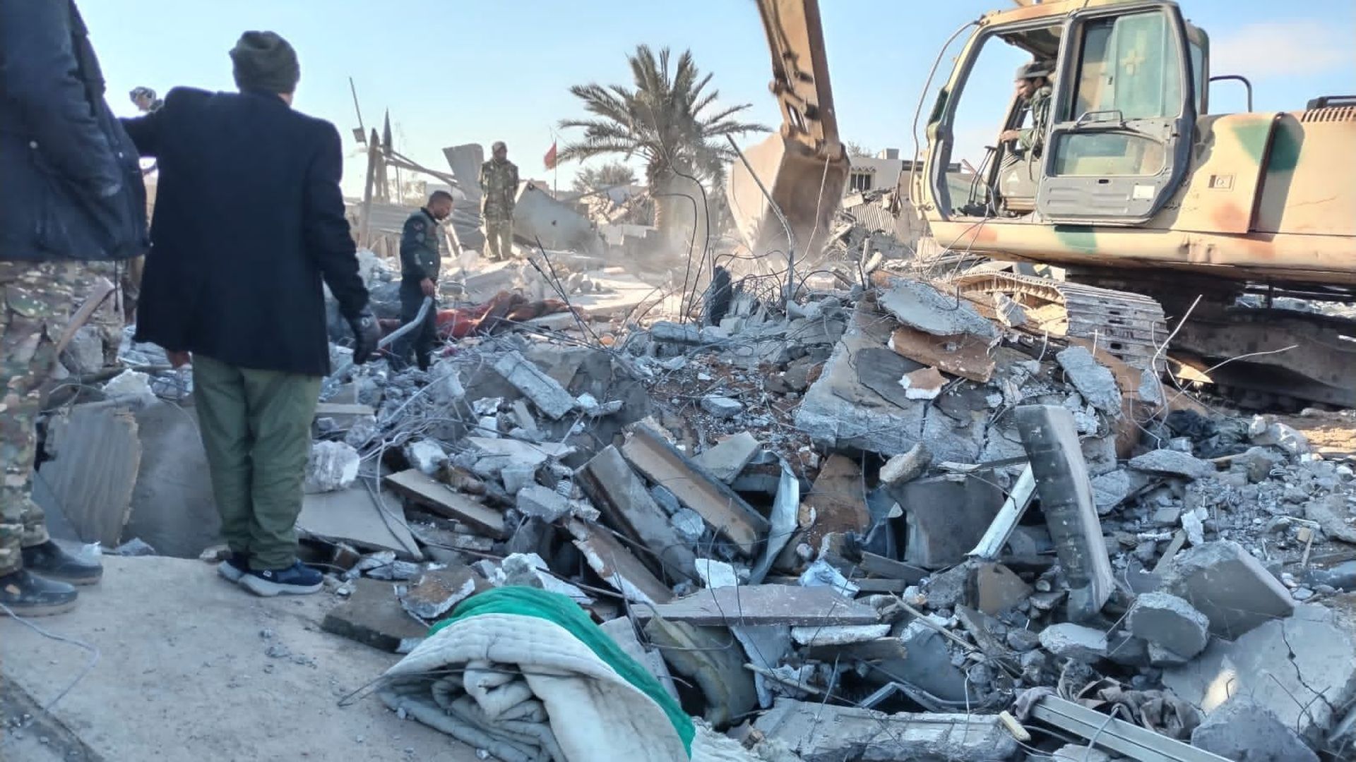 A view of destruction after the US warplanes carried out an airstrike on the headquarters of Hashd al-Shaabi in Al-Qa'im city of Anbar, Iraq