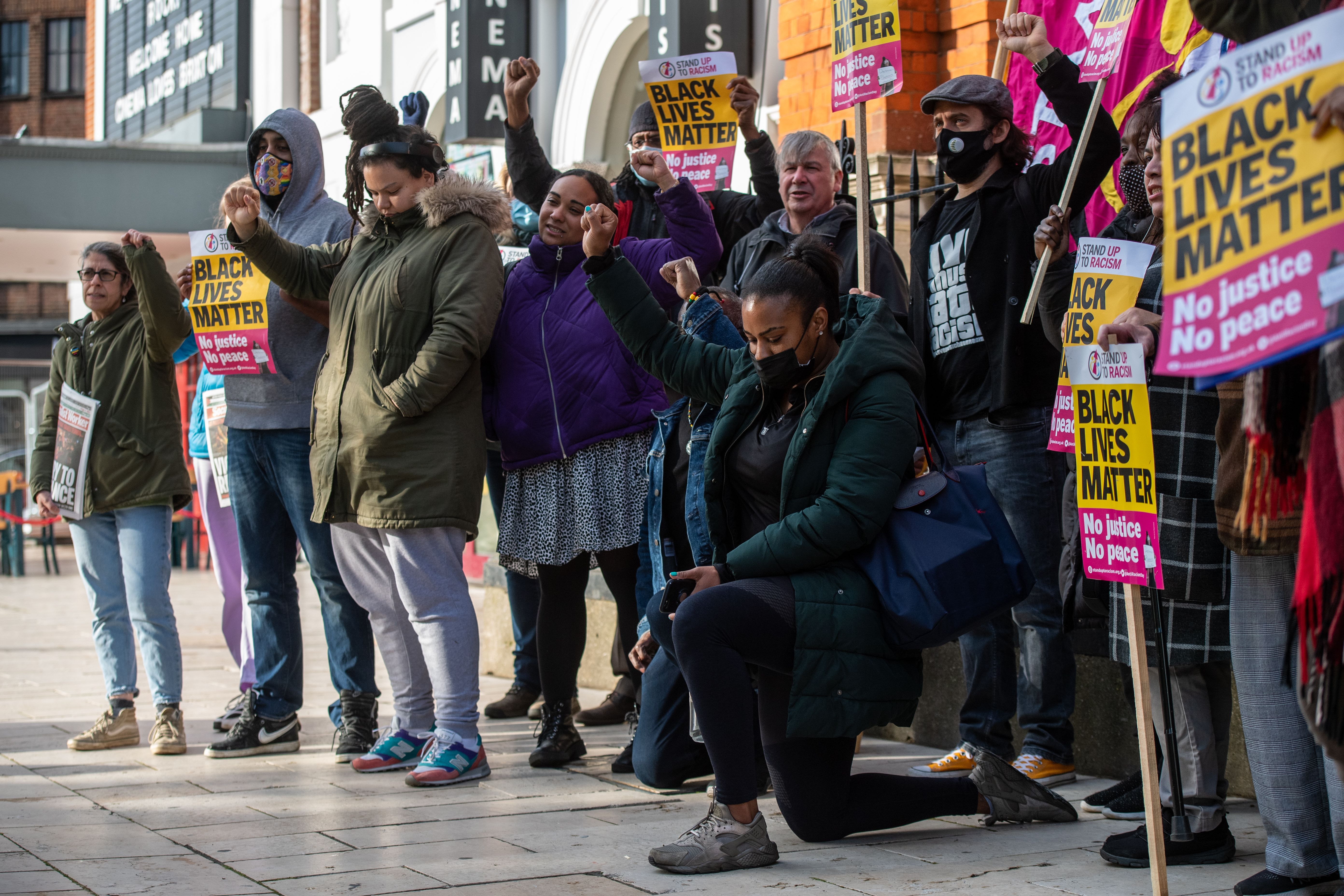 People gather in Windrush Square, Brixton to hear speeches and mark the first anniversary of the death go George Floyd on May 25, 2021 in London, England. 