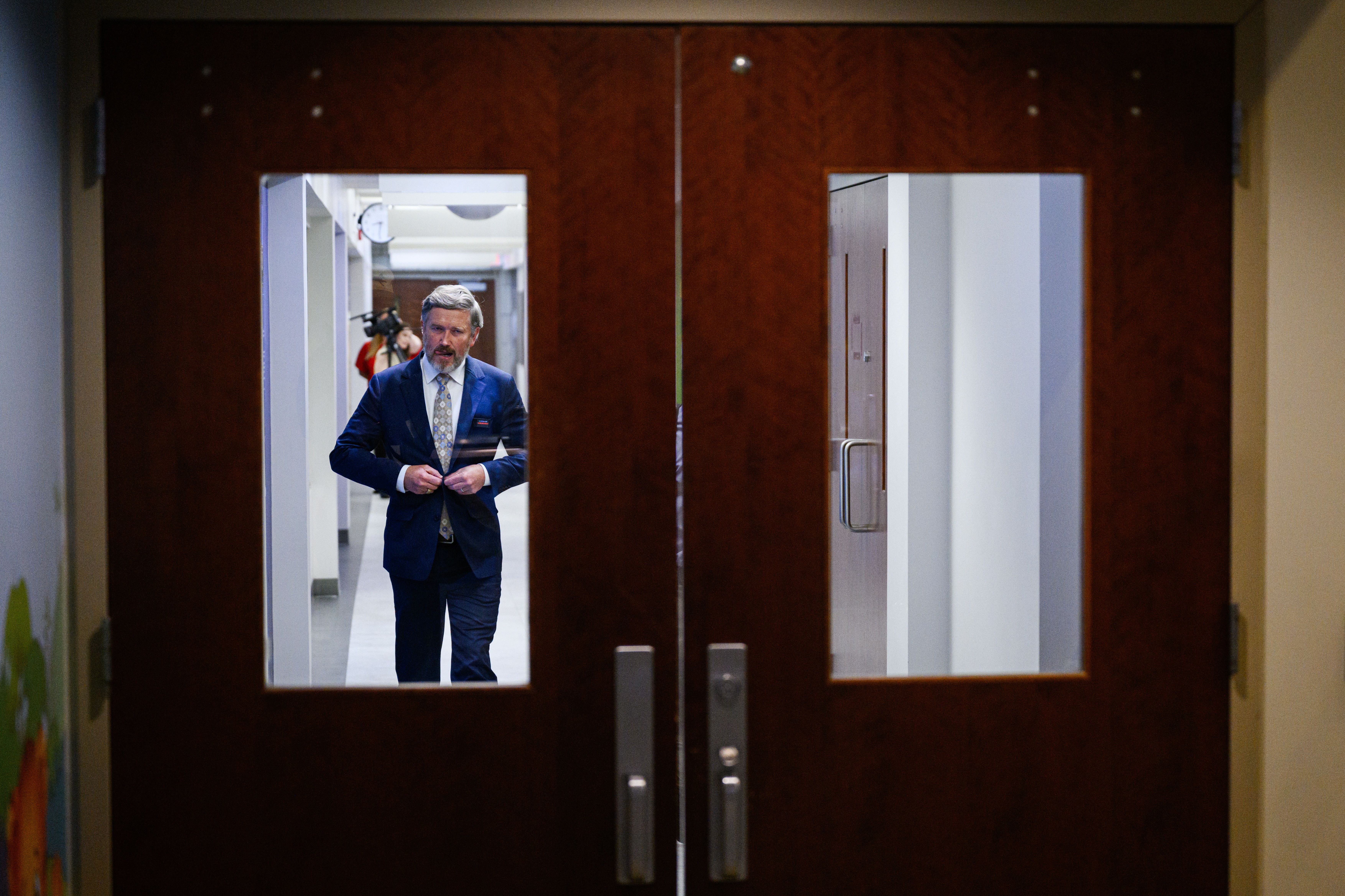 Rep. Thomas Massie (R-Ky.) exits the studio after a debate in Lexington, Ky., earlier this month. 