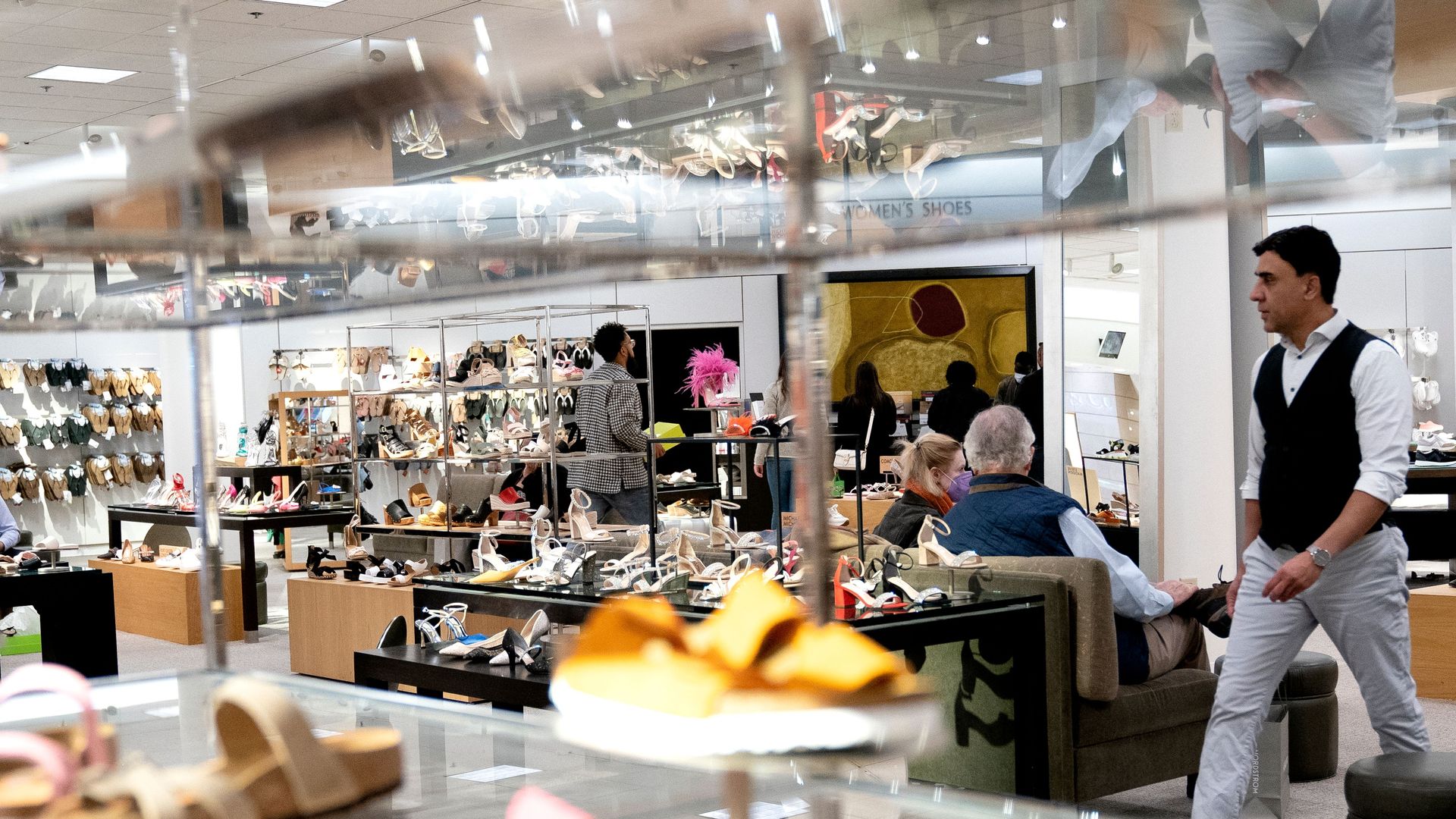 A photo of shoppers inside a mall.