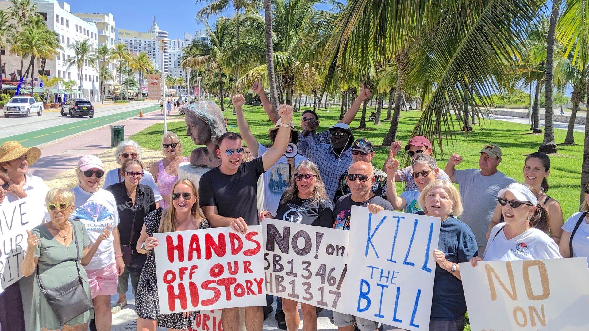 Protesters rally in South Beach against a bill that would make it easier for property owners to demolish historic buildings.