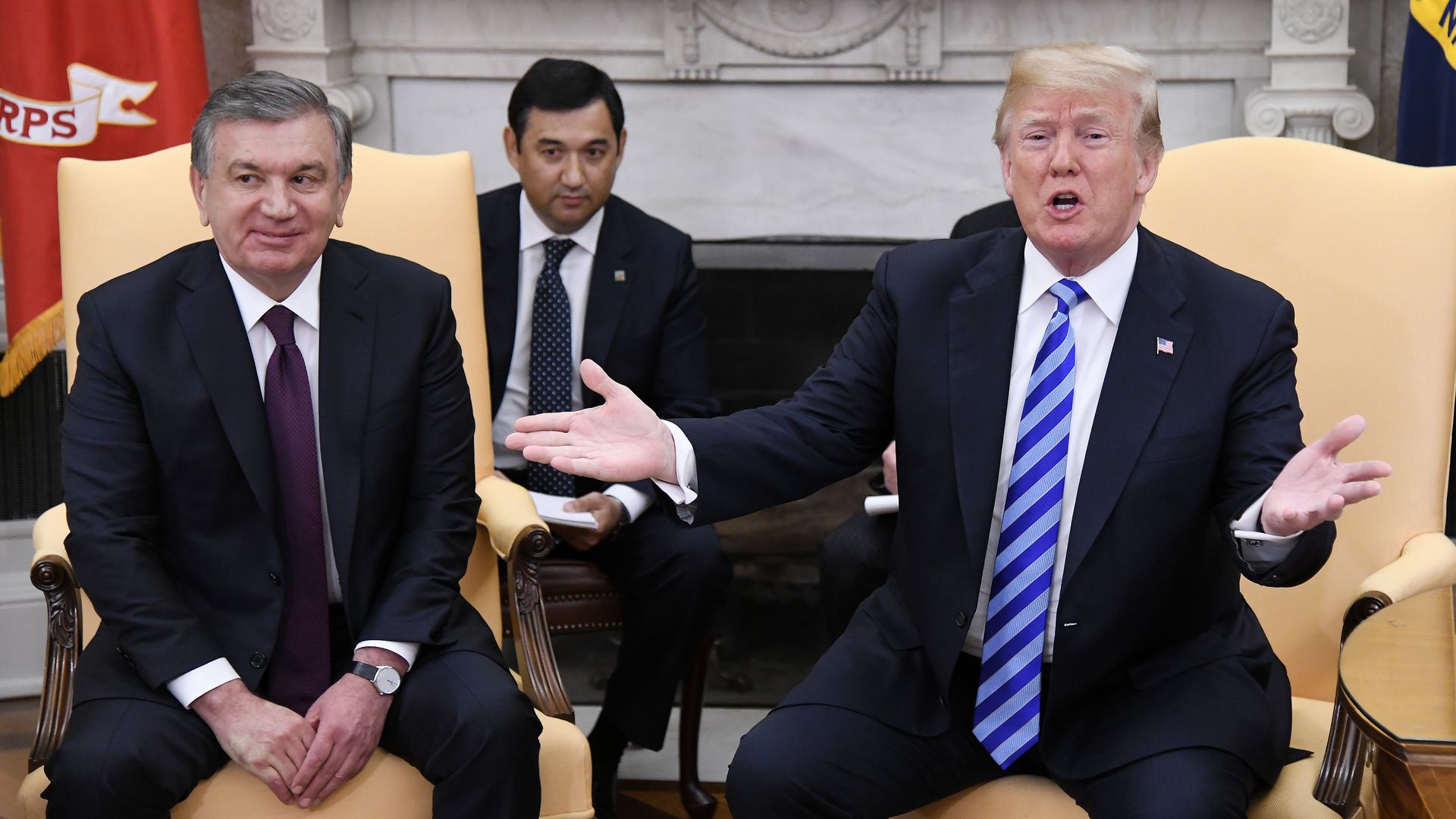 President Donald Trump speaks as the President of the Republic of Uzbekistan Shavkat Mirziyoyev listens during a meeting in the Oval Office 