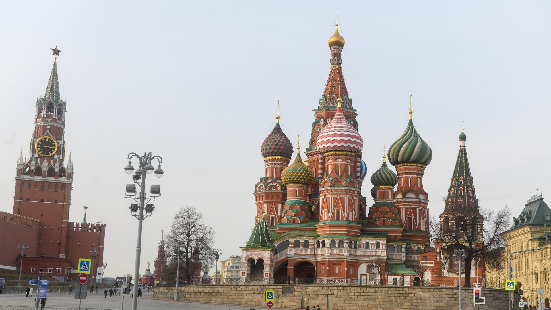 MOSCOW, RUSSIA - 2025/03/10: A car passes by the Kremlin and the Cathedral of Intercession of the Blessed Virgin Mary. (Photo by Daniel Felipe Kutepov/SOPA Images/LightRocket via Getty Images)