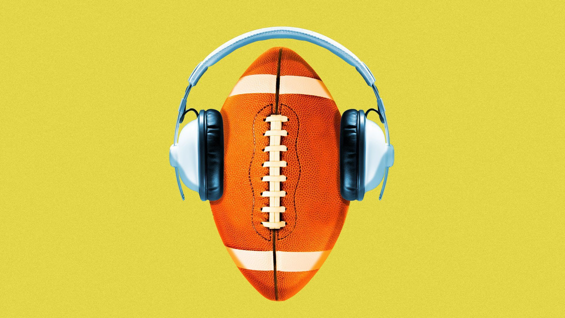 a football with headphones over it