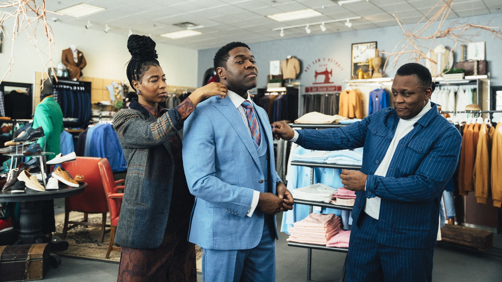 A scene from Pure Michigan's new campaign featuring comedian Sam Richardson and Lions legend Barry Sanders.