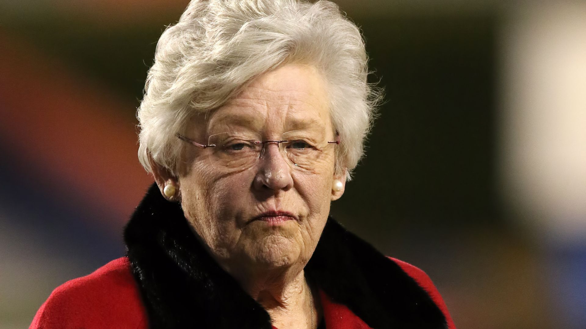 Photo of Kay Ivey looking off into the distance