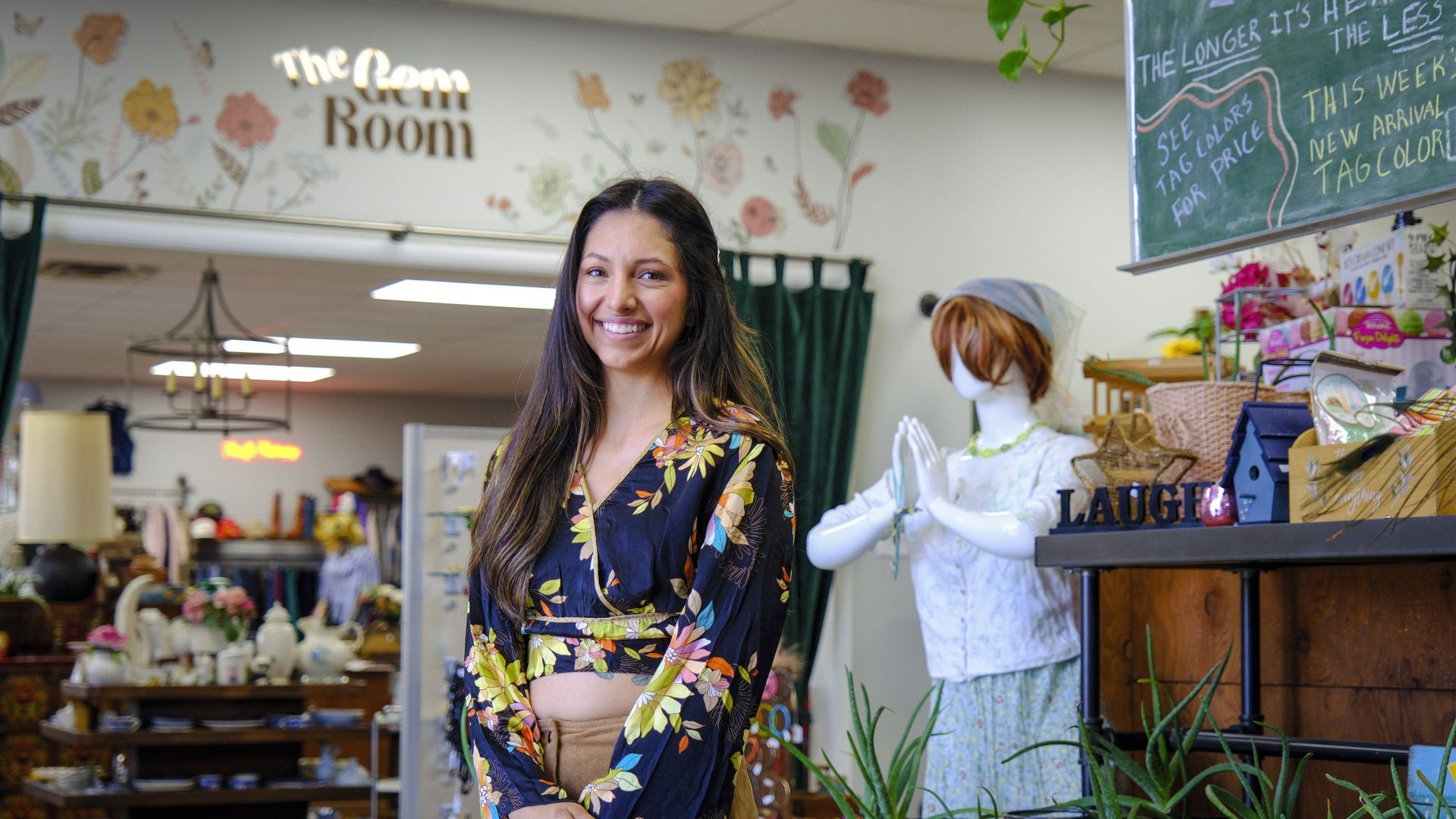 A photo of Dancing Iglesias in her thrift store