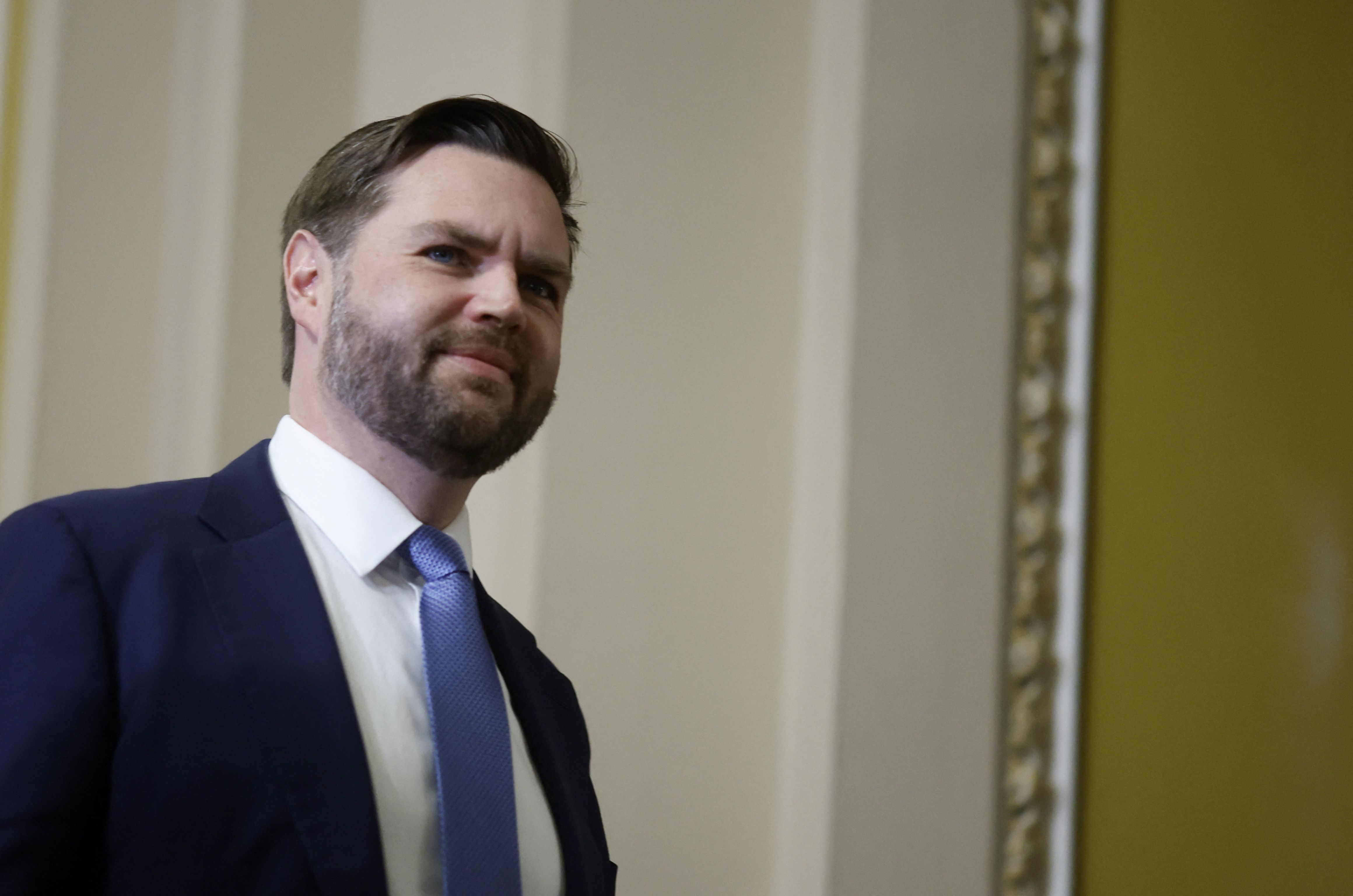 Vice-President elect JD Vance arrives to pay his respects in front of the flag-draped casket at the Lying in State Ceremony for former President Jimmy Carter at the US Capitol Rotunda in Washington, DC on January 8, 2025.