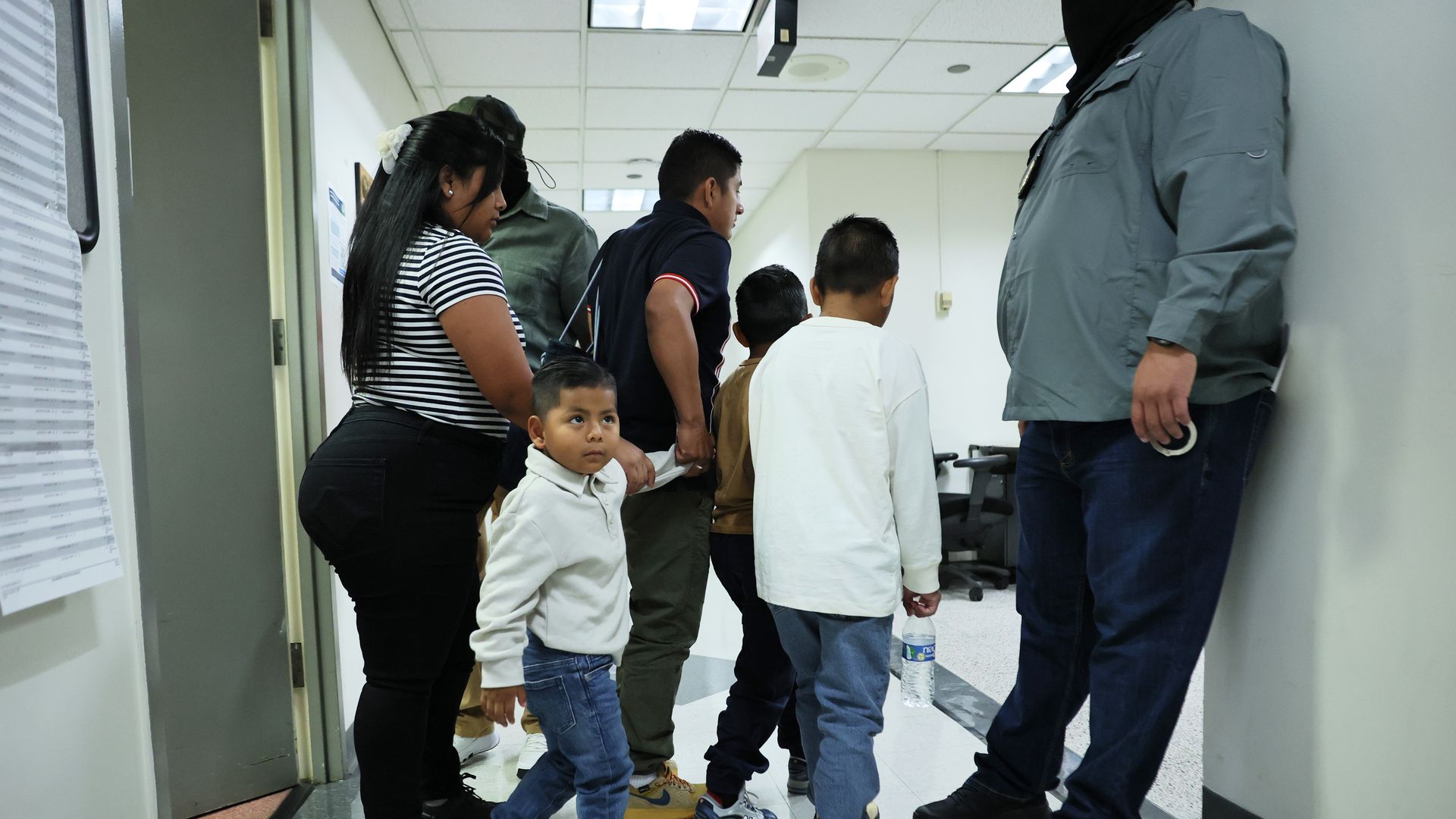 Federal agents patrol the halls of immigration court as people leave their court hearings at the Jacob K. Javitz Federal Building on September 03, 2025 in New York City. Photo: Michael M. Santiago/Getty Images.