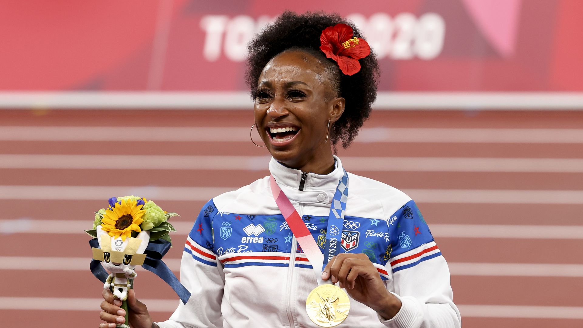 Gold Medalist Jasmine Camacho-Quinn of Puerto Rico during the medal ceremony of the Women's 100m Hurdles on day ten of the athletics events of the Tokyo 2020 Olympic Games