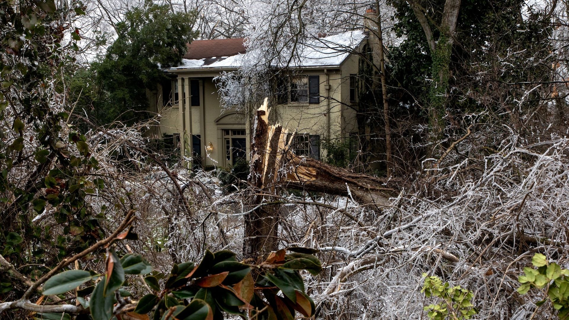 Trees and debris cover a Nashville home following the ice storm.