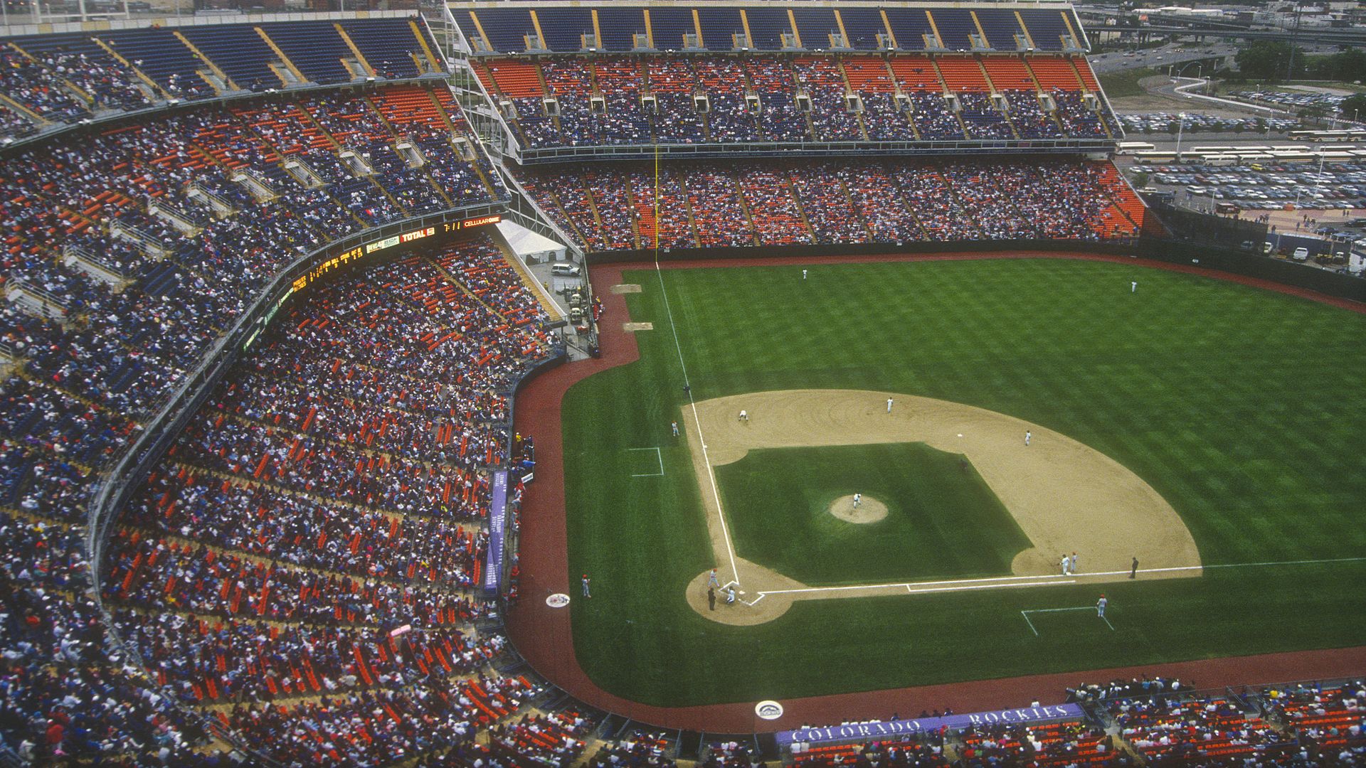 The first home opener for the Rockies took place in orange-and-blue fashion in April 1993 at Mile High Stadium. The Rockies beat the Expos 11-4. Photo: Focus on Sport/Getty Images