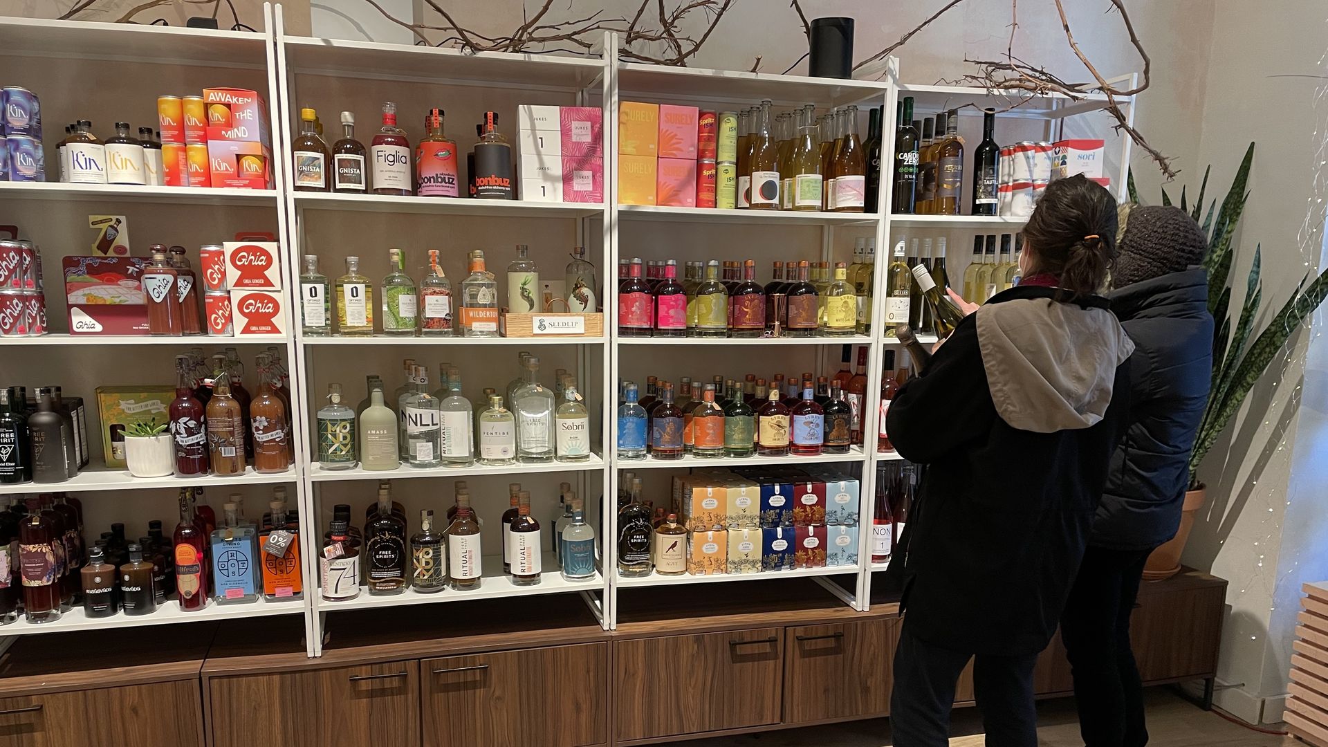 Shelves in a store filled with non-alcoholic faux booze drinks