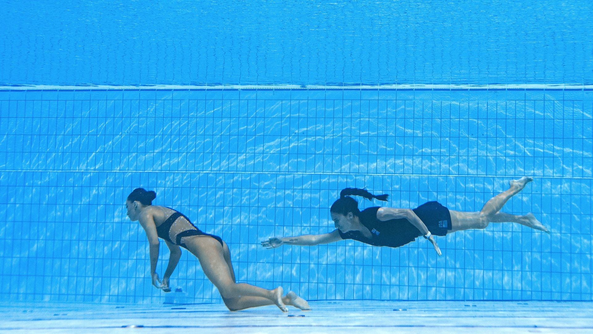 Coach saves diver