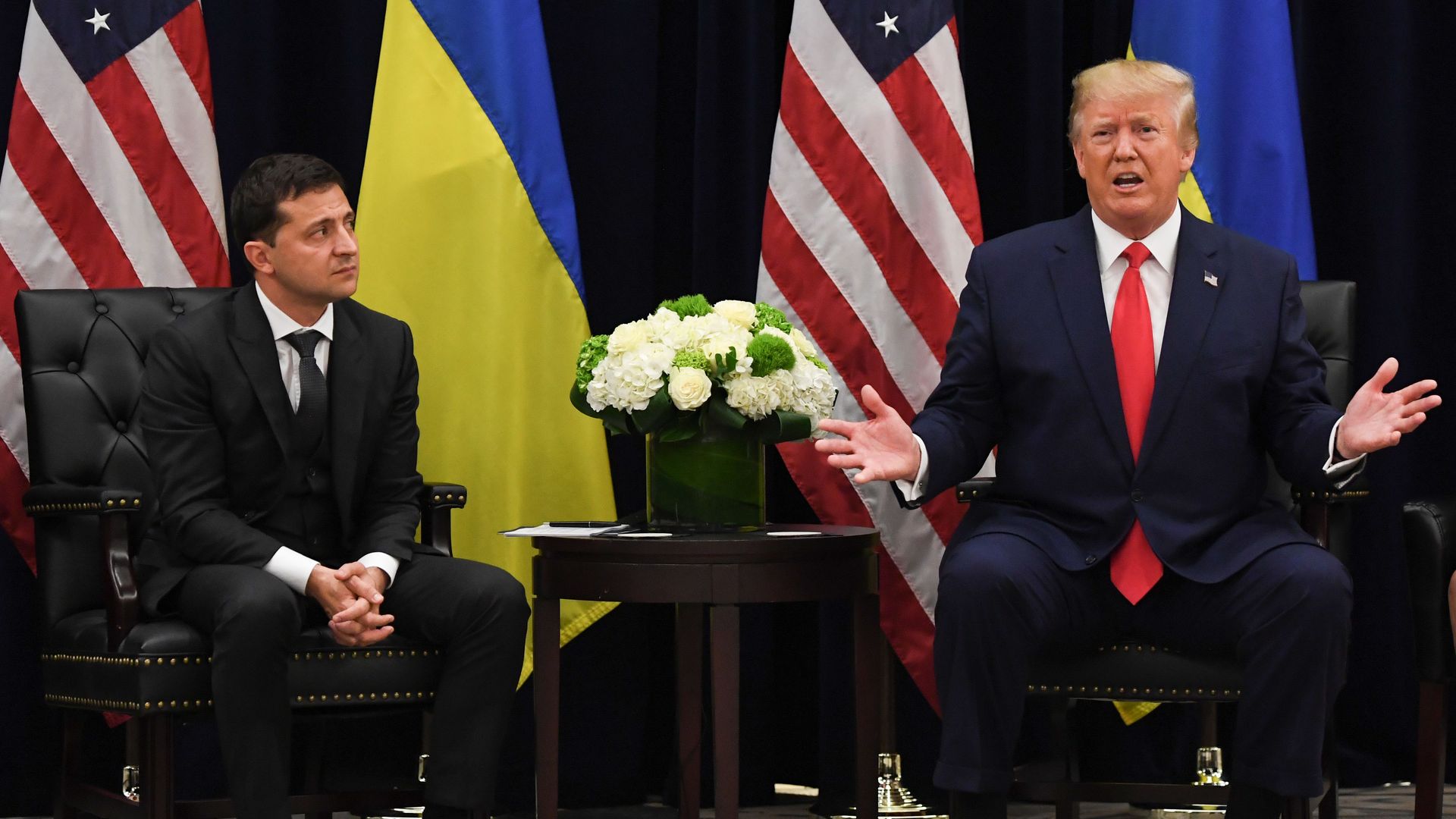 President Trump speaks as Ukrainian President Volodymyr Zelensky looks on during a meeting in New York on September 25