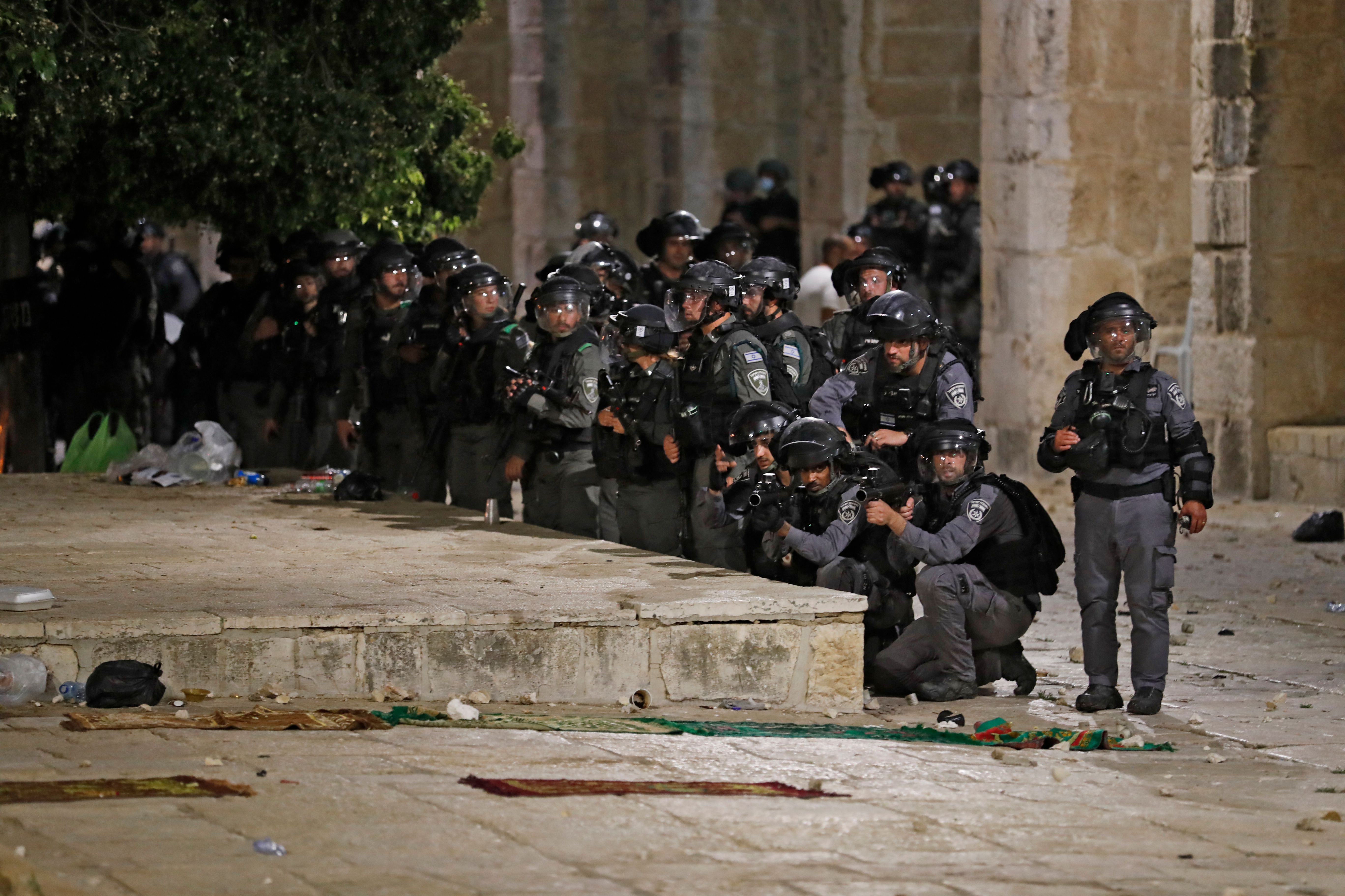 Israeli security forces deploy during clashes with Palestinian protesters at the al-Aqsa mosque compound in Jerusalem,