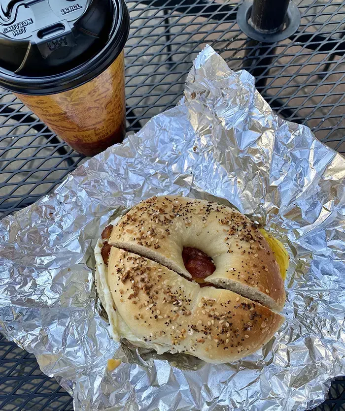 Everything bagel with bacon, egg and cheese from Poppy’s on South Boulevard. Photo: Emma Way/Axios