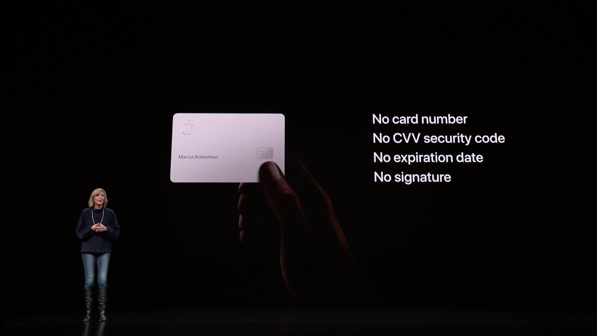 Apple's new titanium credit card on a screen with Apple VP Jennifer Bailey standing by