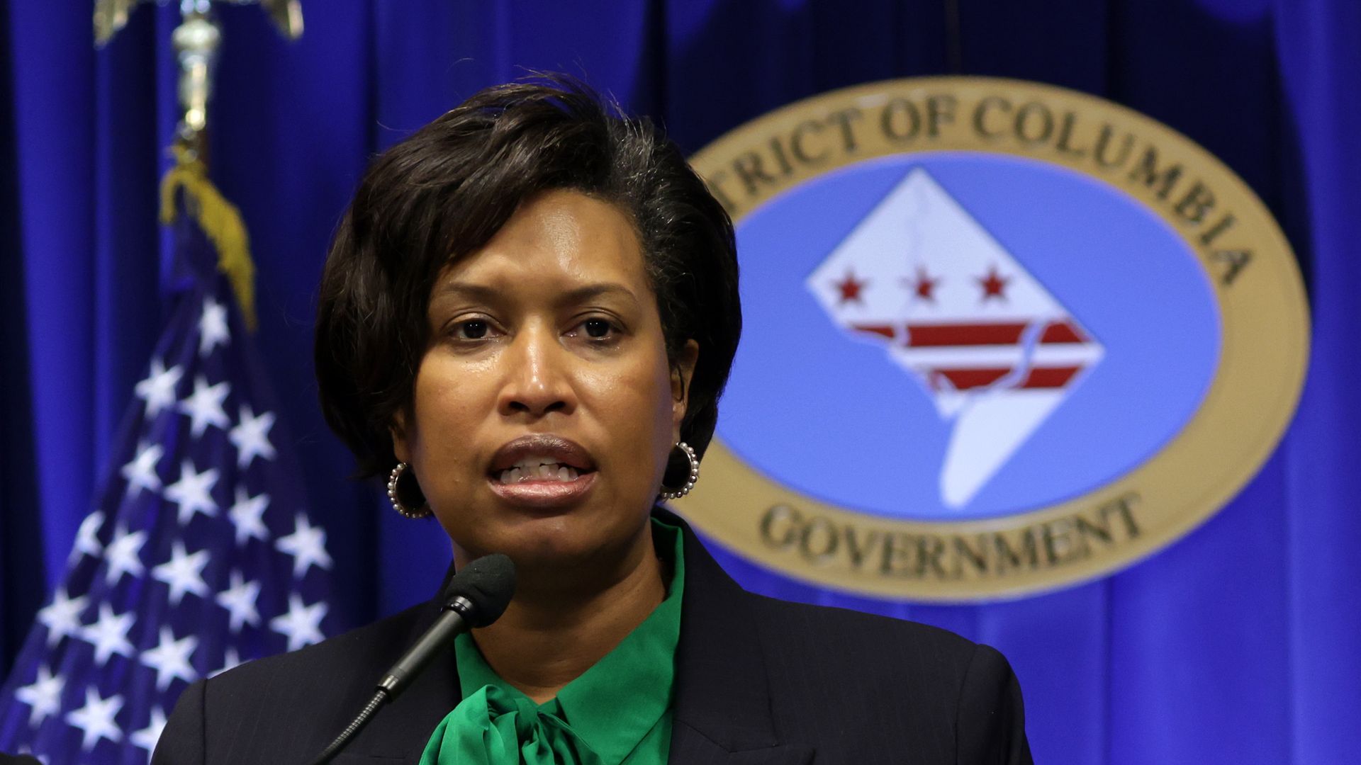Washington, DC, Mayor Muriel Bowser (R) speaks at a news conference at the John Wilson Building March 14, 2022 in Washington, DC.