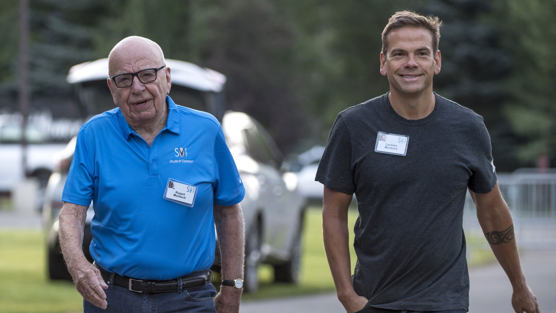 Rupert Murdoch and his son Lachlan Murdoch walking side by side.