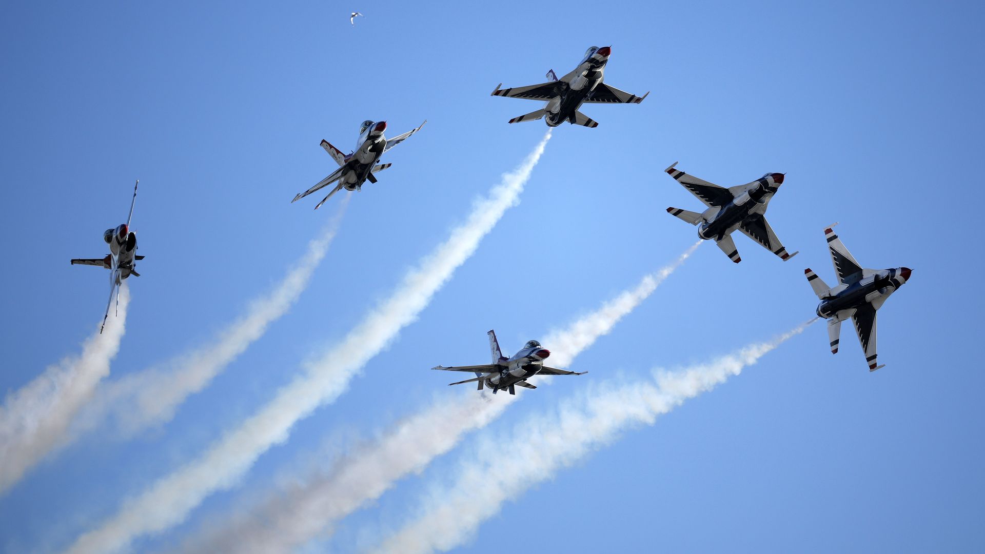 Six planes in the Air Force Thunderbirds fly in formation.