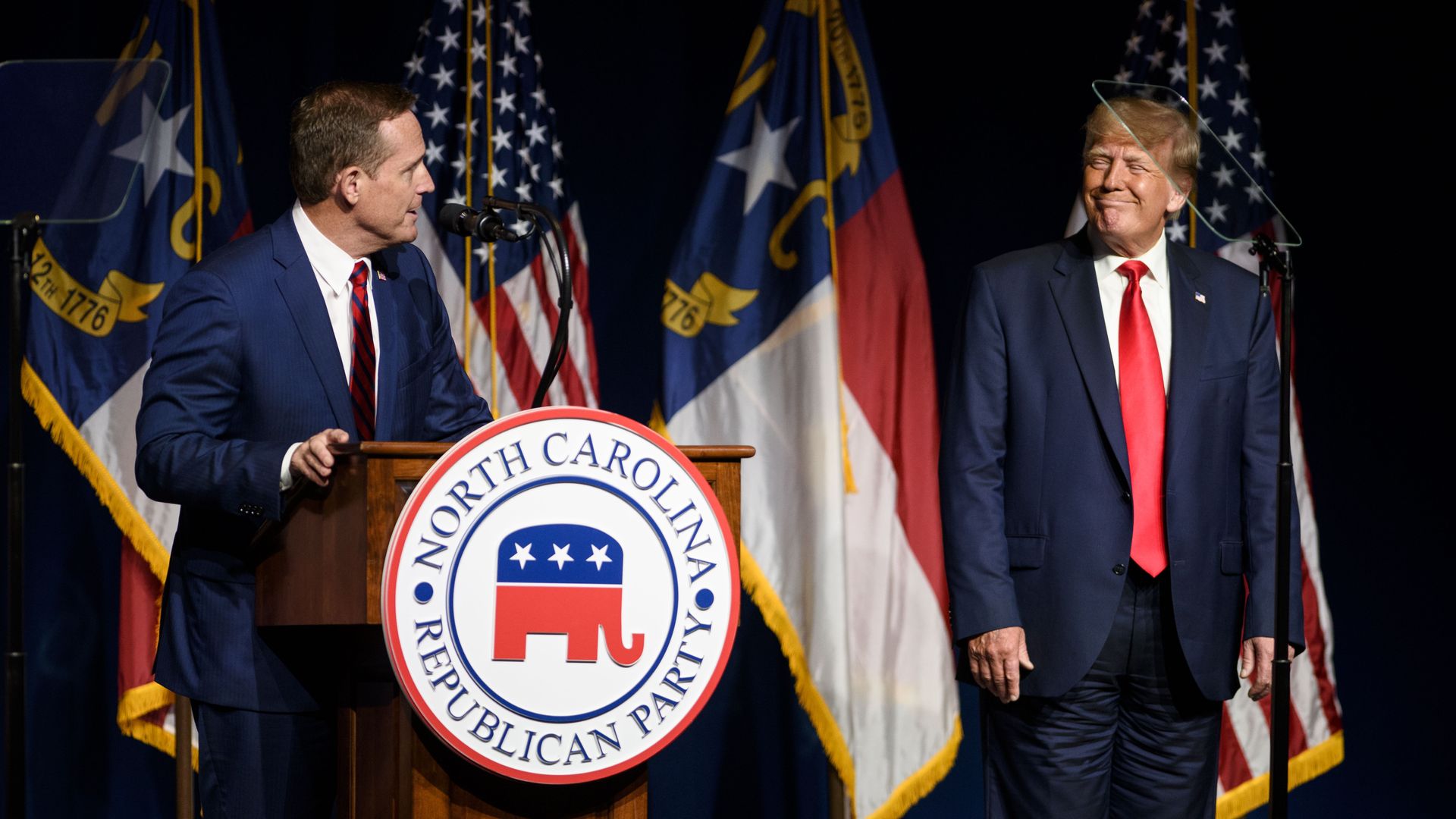 Former U.S. President Donald Trump listens to Ted Budd announce he's running for the NC Senate at the NCGOP state convention on June 5, 2021 in Greenville, North Carolina. 