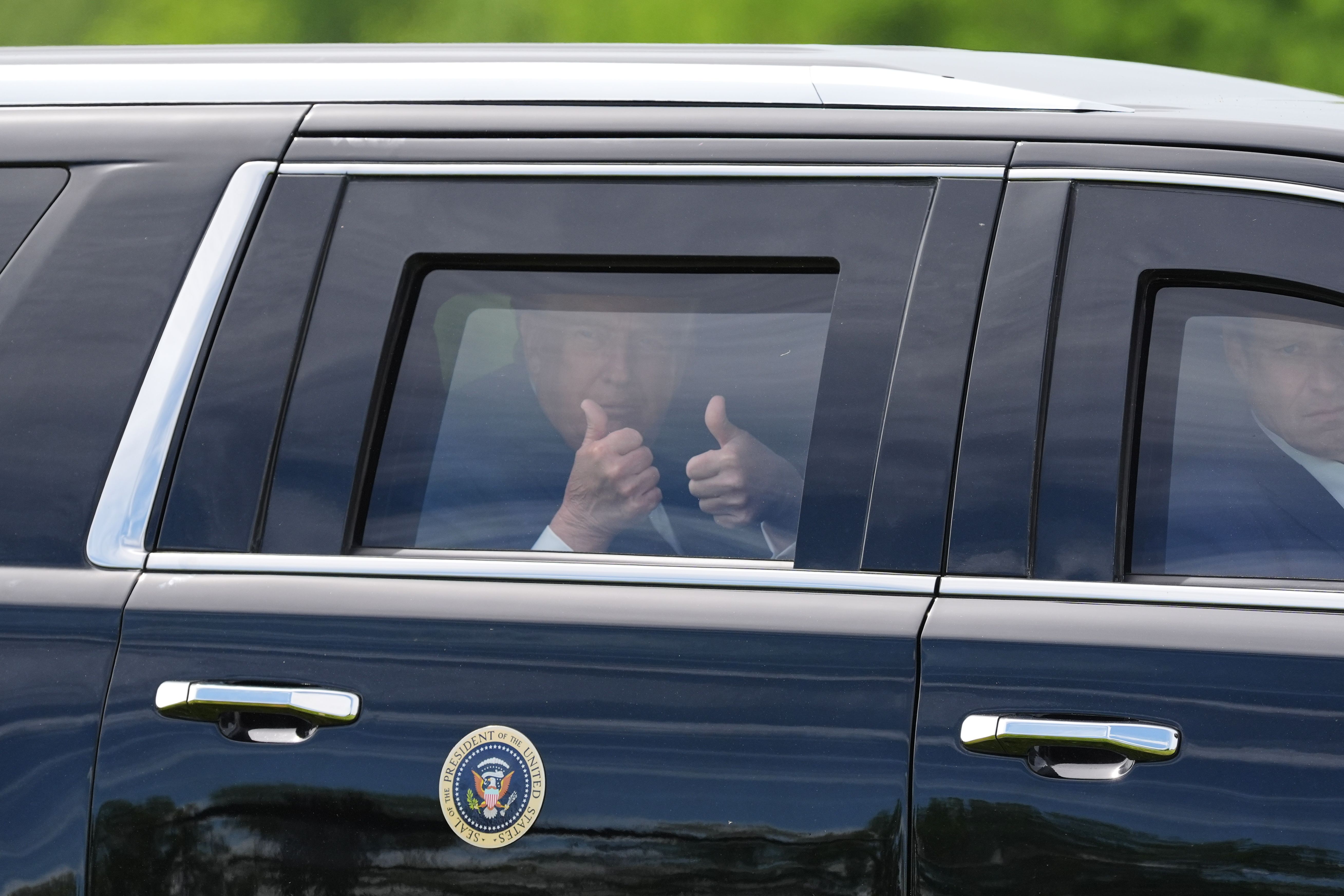 President Trump rides in the presidential limousine after arriving on Marine One at Rockland Community College in Suffern, N.Y. on Friday.