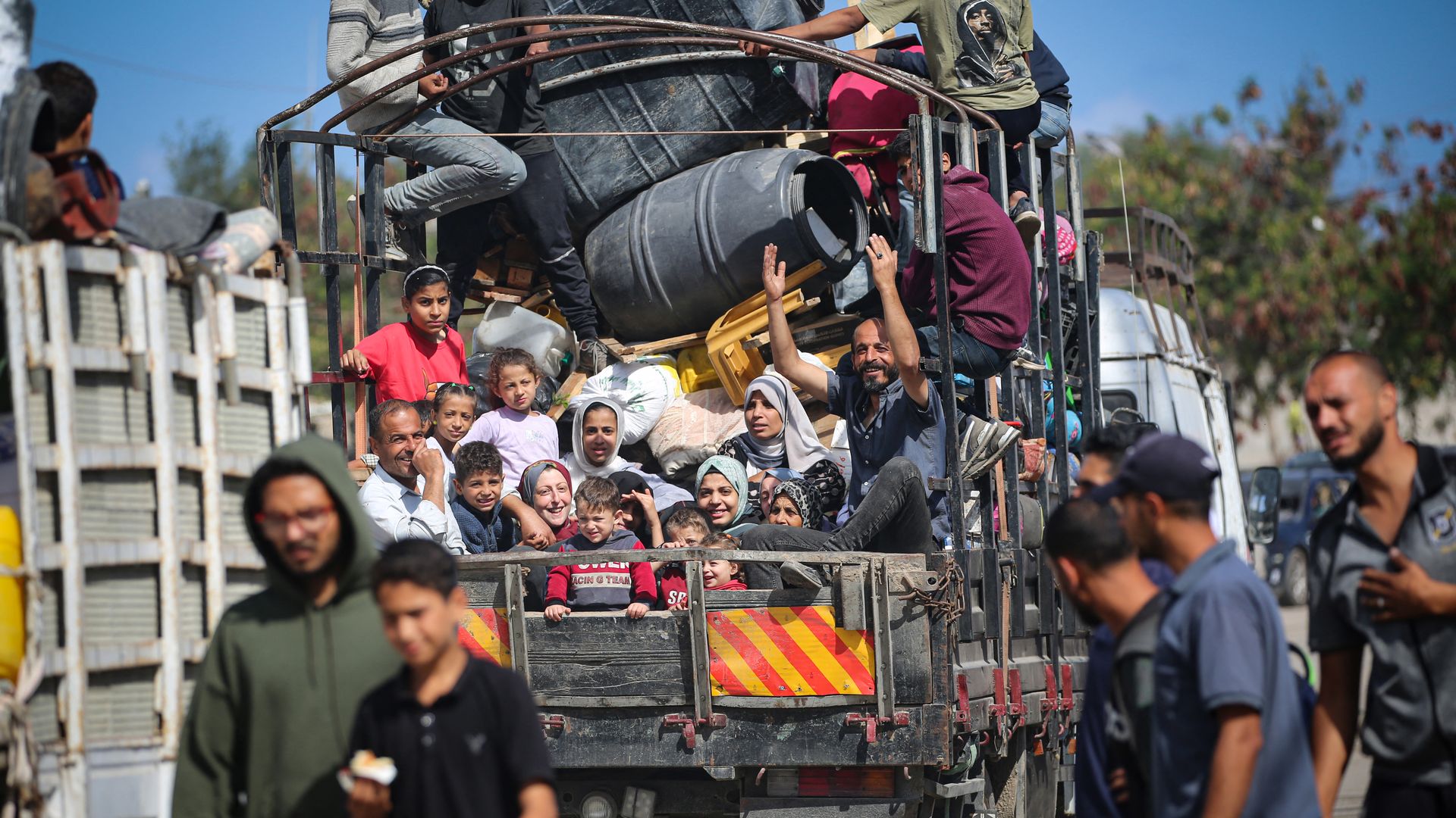 Displaced Palestinians flee Rafah with their belongings to safer areas in the southern Gaza Strip on May 7