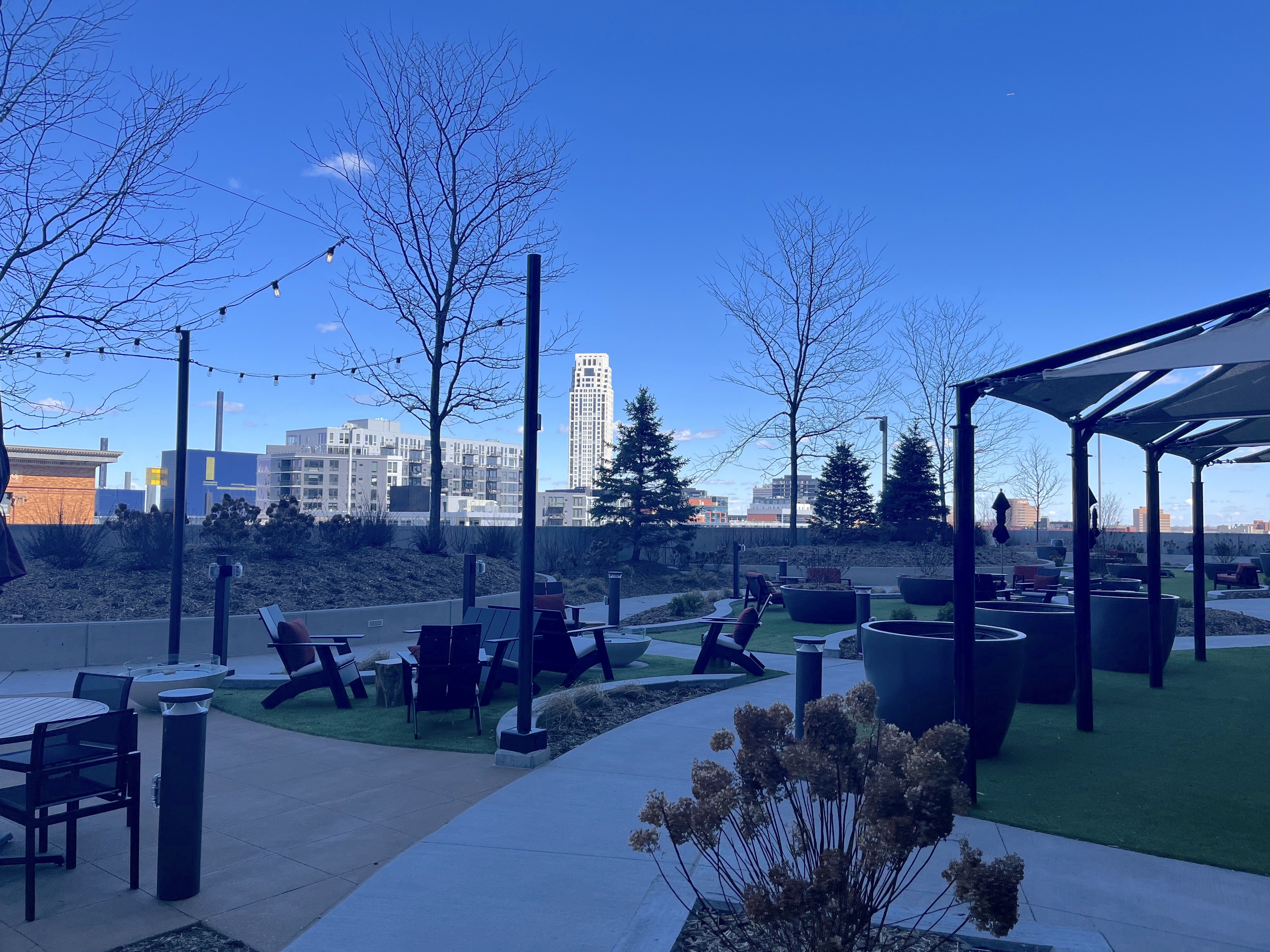 A terrace with astro turf and trees