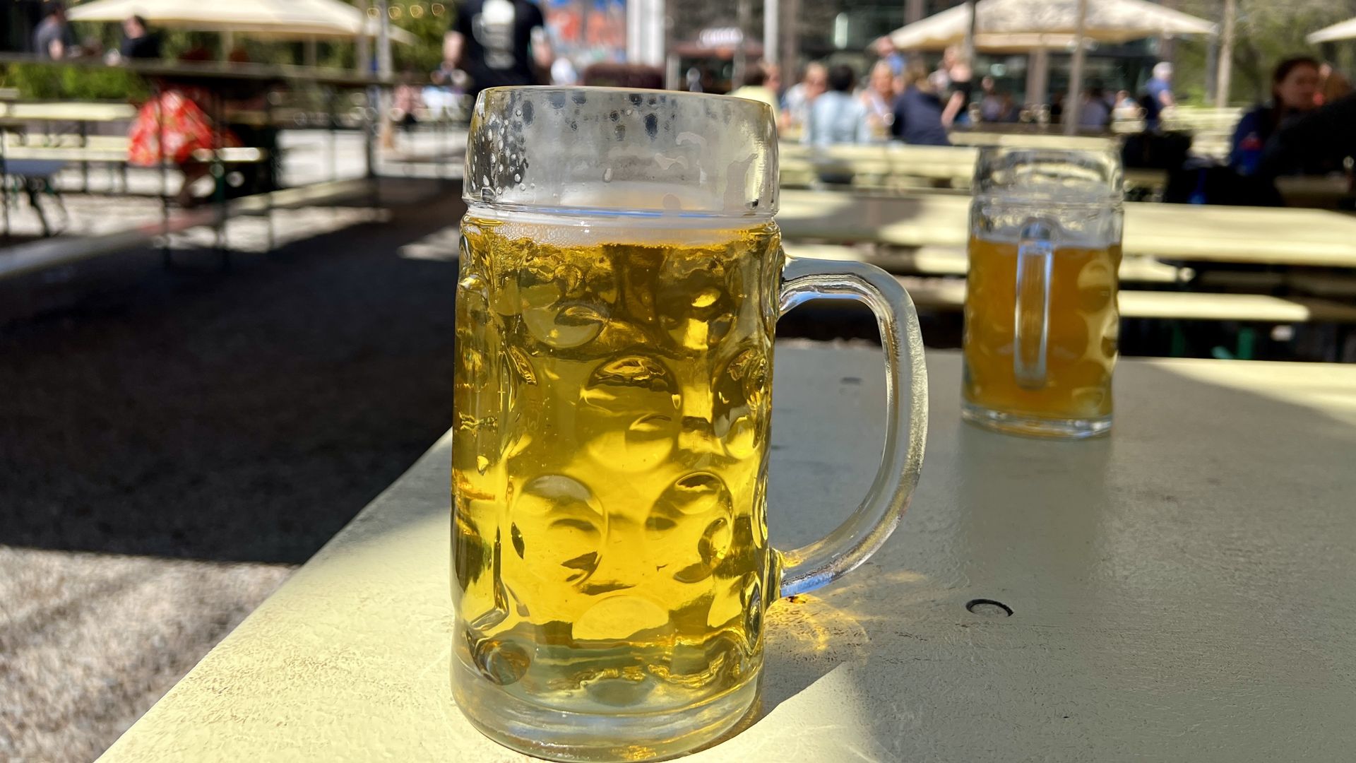 Beers on a picnic table at brewery in Charlotte.