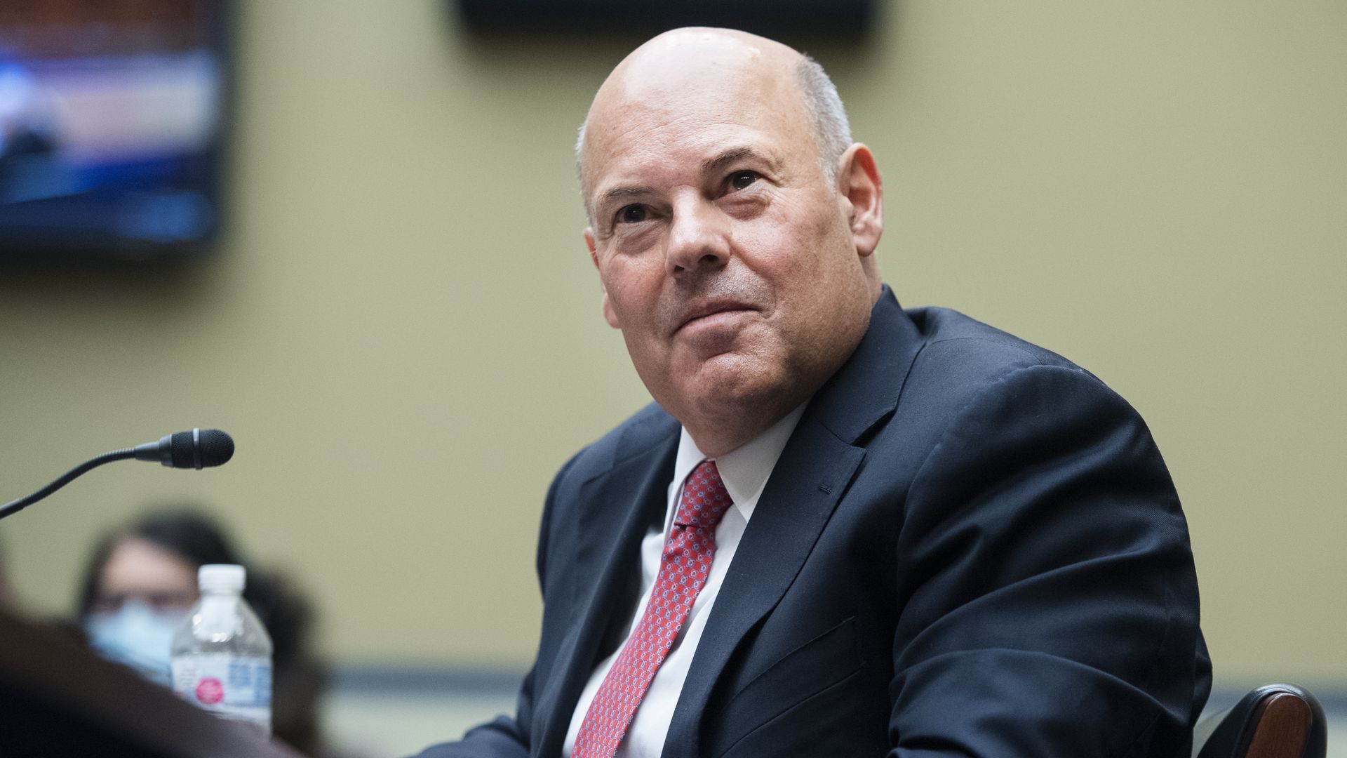  Postmaster General Louis DeJoy testifies during a hearing before the House Oversight and Reform Committee on August 24, 2020 on Capitol Hill in Washington, DC. 
