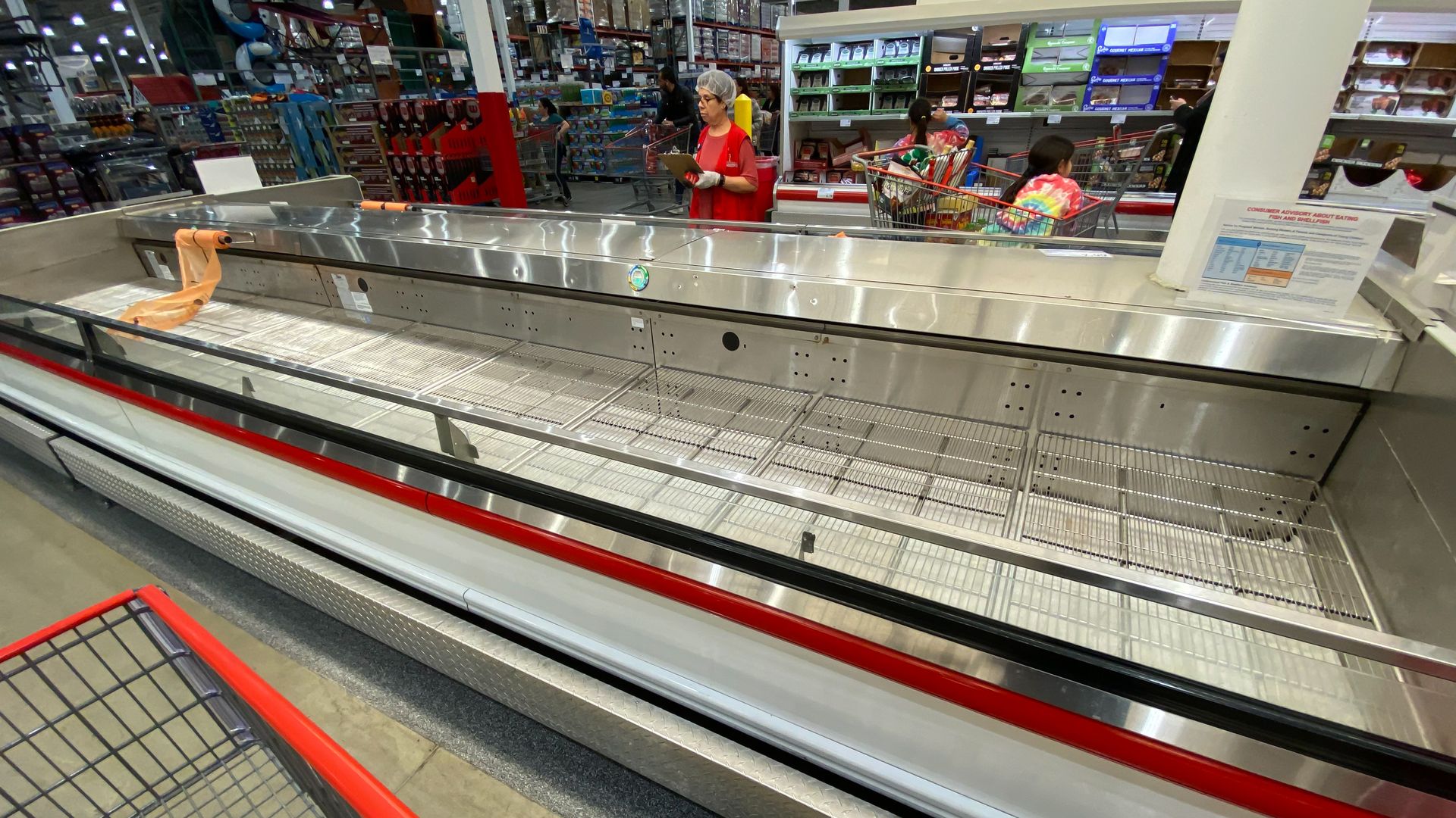 Empty freezer cases at Costco