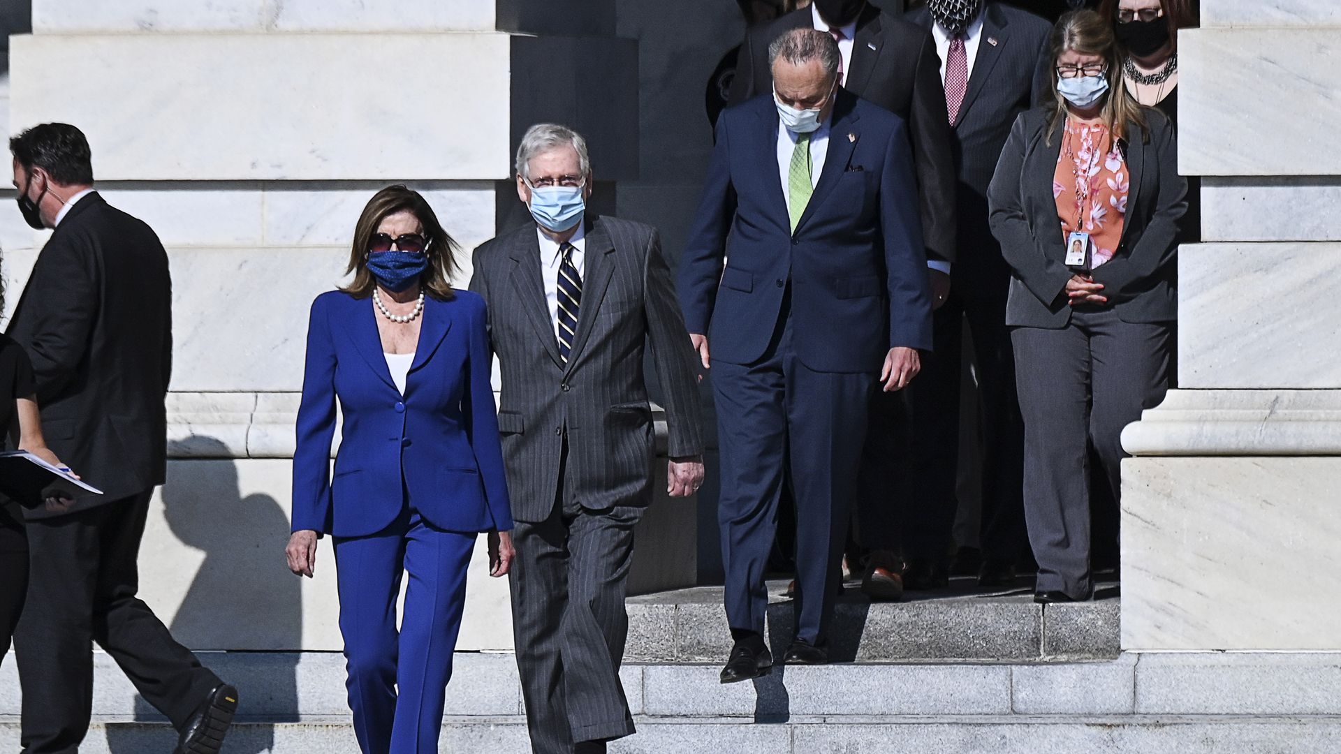Nancy Pelosi, Mitch McConnell and Chuck Schumer on the steps of the Capitol