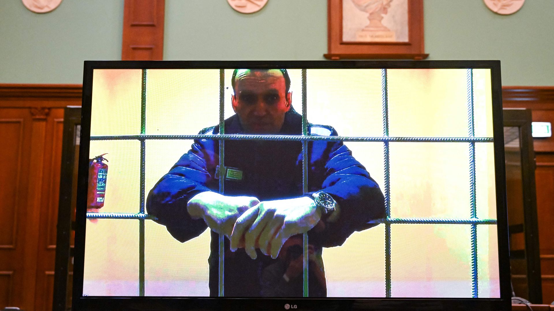 Russian opposition leader Alexei Navalny on a screen during a hearing in Moscow on May 24.