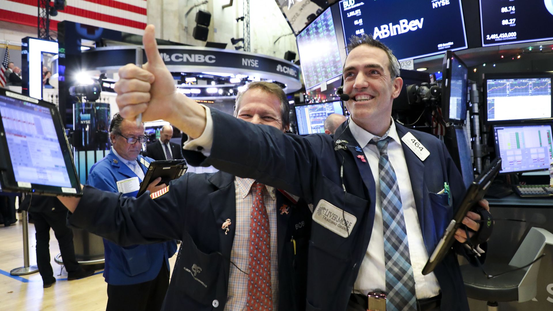 Traders work at the NYSE in New York  
