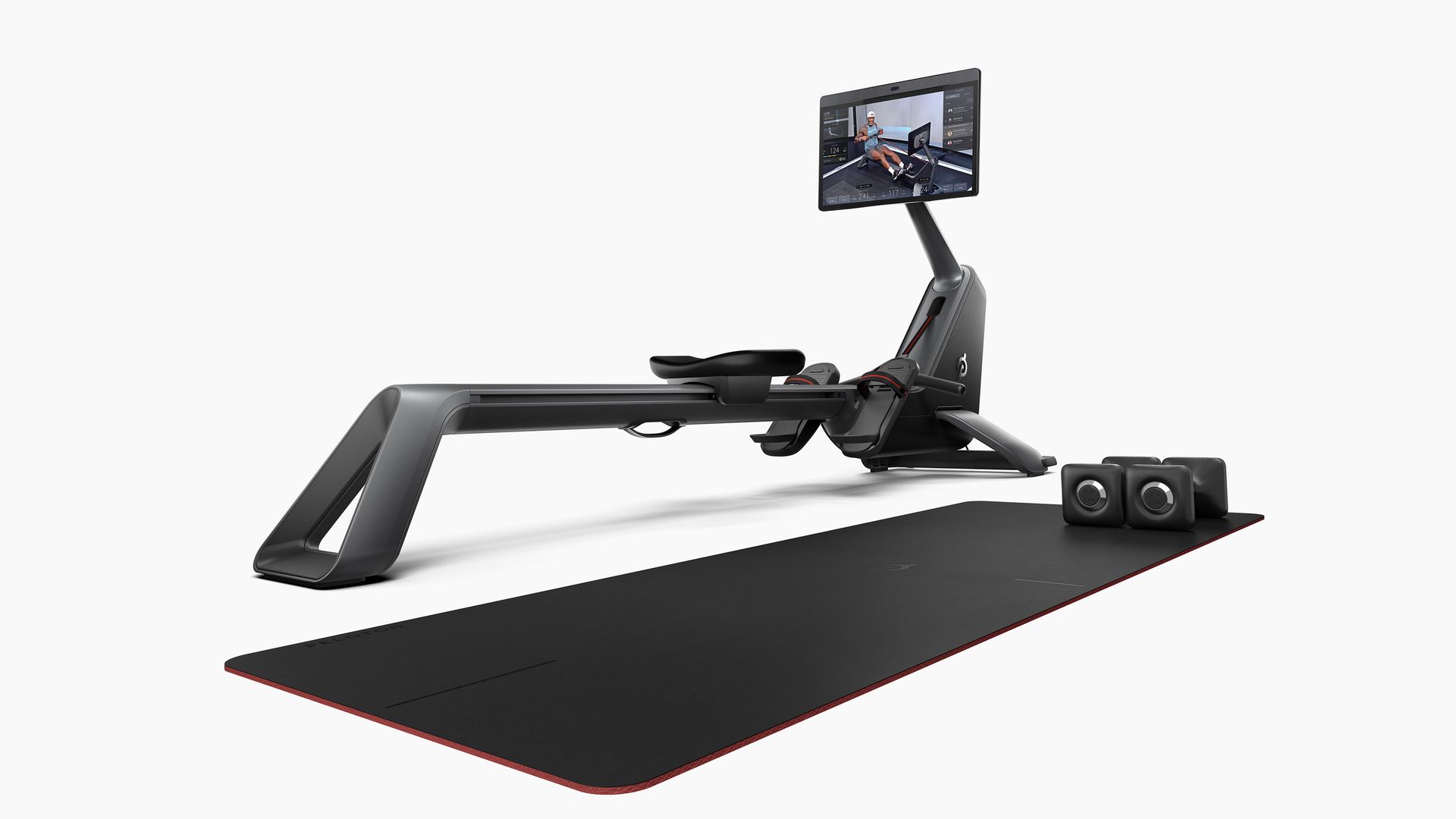 A rowing machine against a white backdrop