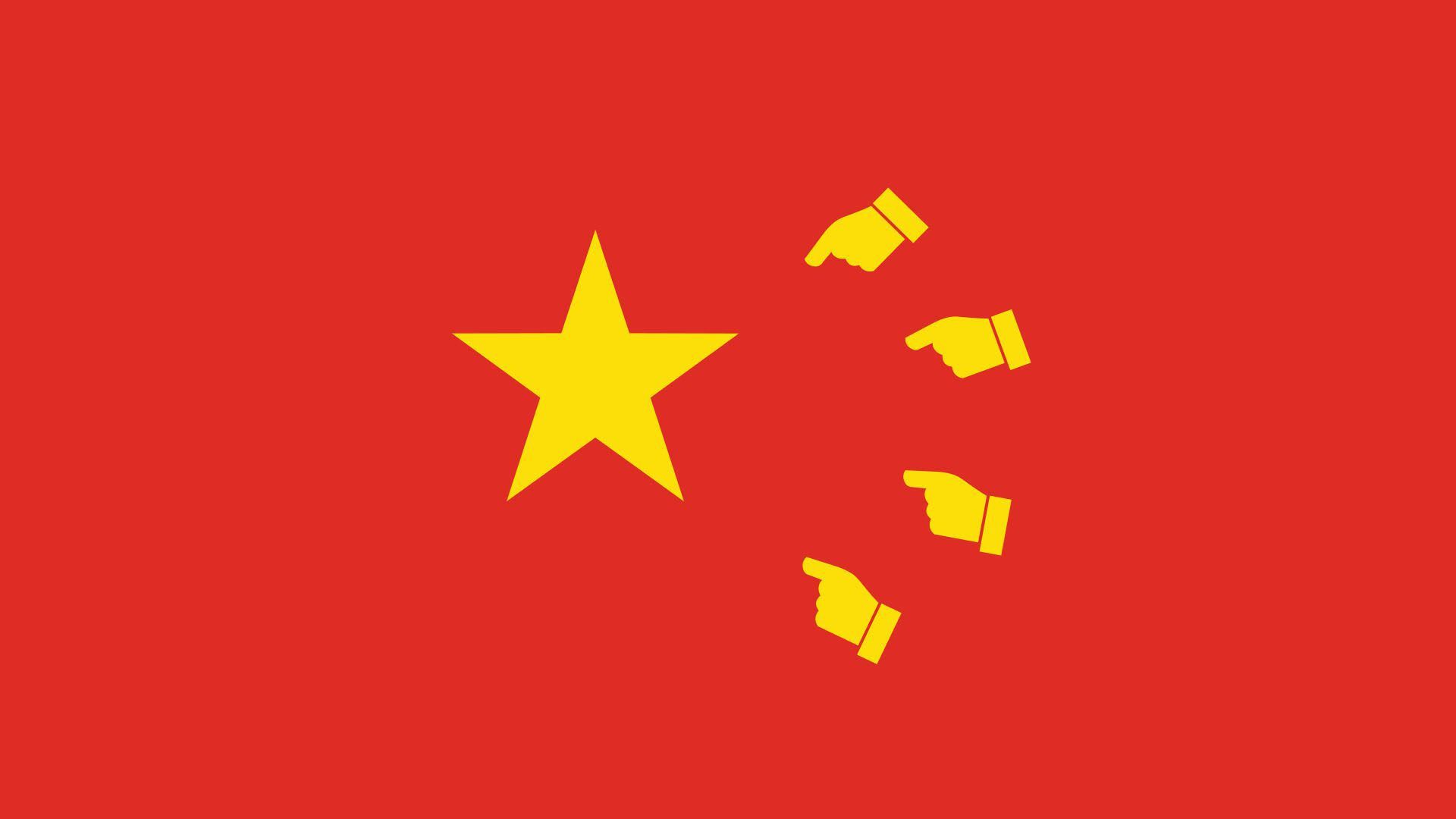 A chinese flag with fingers pointing on it.