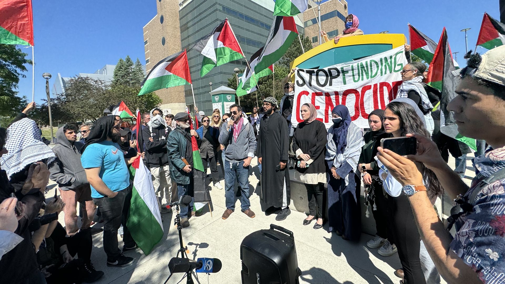 Student leader Ali Hassan and attorney Fatina Abdrabboh lead a press conference on campus hours after Wayne State police arrested 12 people during the tear down of the encampment that began a week ago.