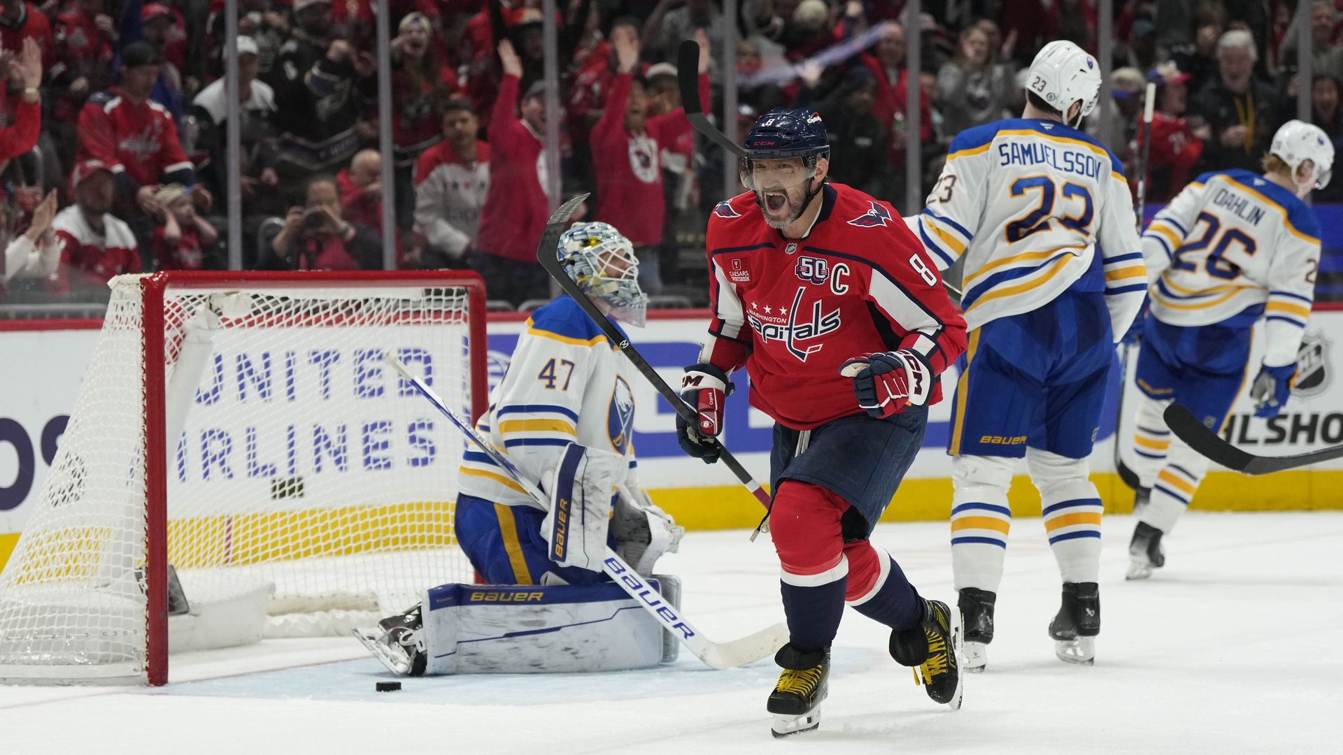 Alex Ovechkin skates away after scoring a goal