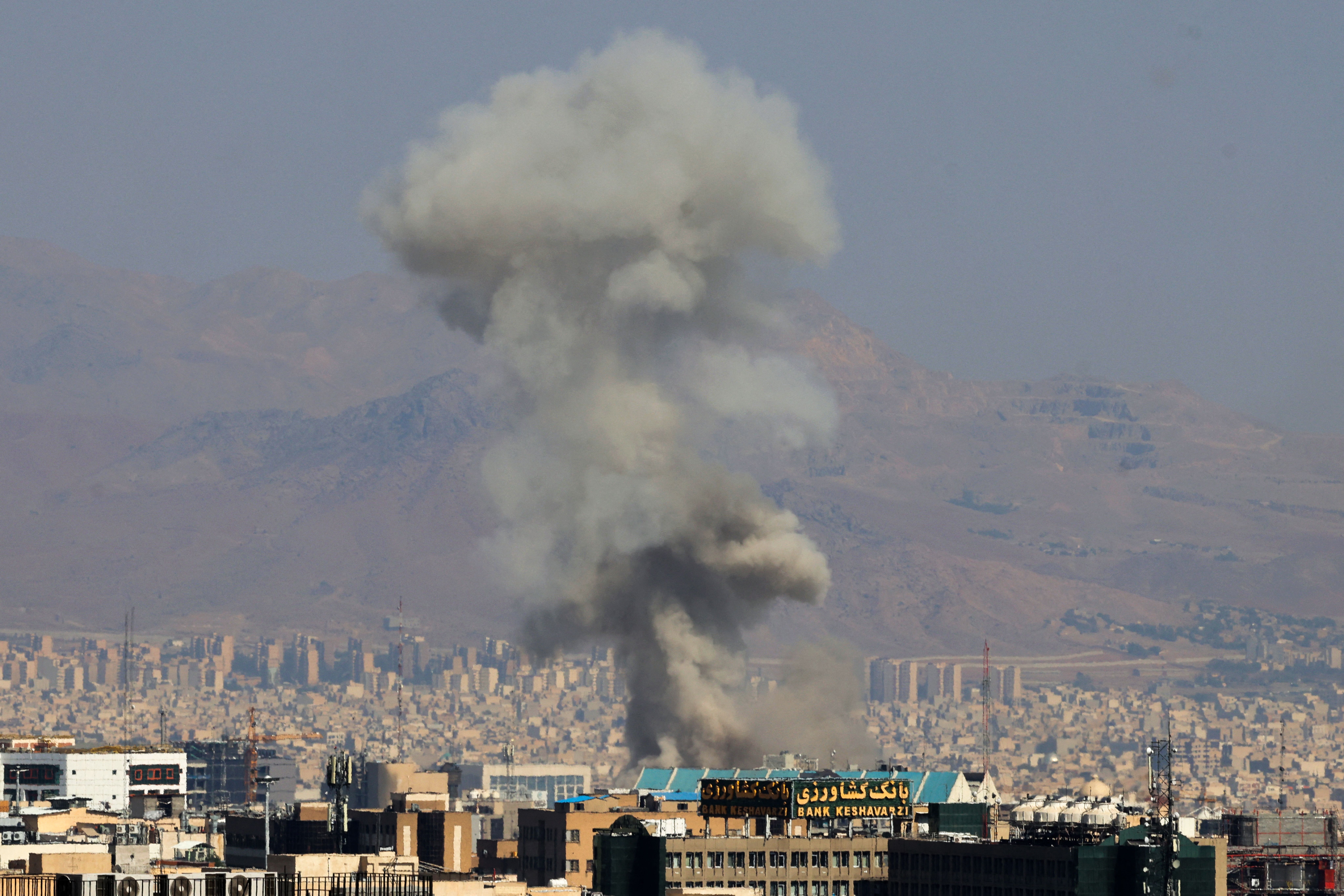 Smoke billows following an explosion in central Tehran on June 15, 2025. Iranian media said an Israeli strike hit the Tehran police headquarters in the city centre on June 15, as the two foes exchanged fire for a third day. (Photo by Atta KENARE / AFP) (Photo by ATTA KENARE/AFP via Getty Images)