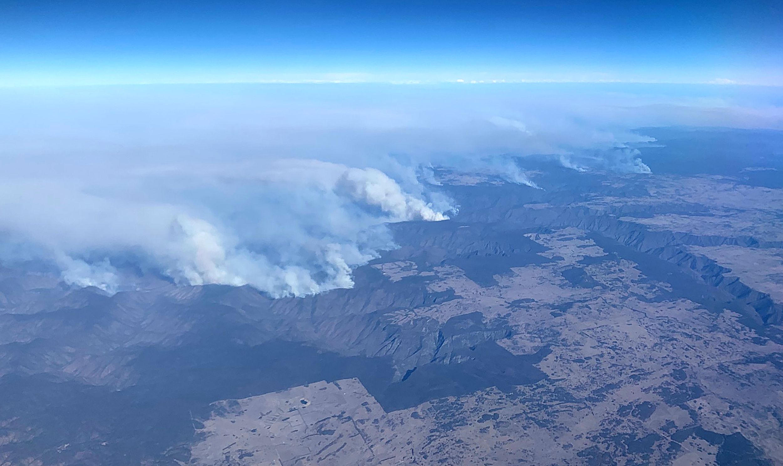 Photo taken on November 9, 2019 shows bushfires taken from a plane in over north eastern New South Wales. 