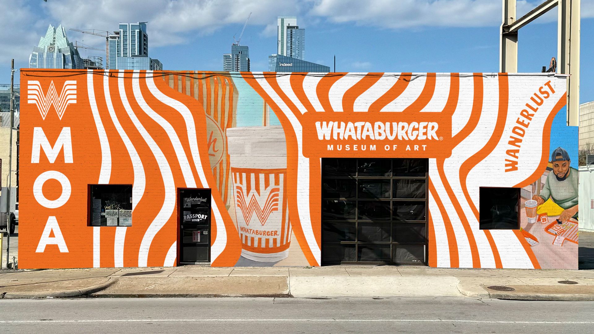 A wine shop is transformed with a mural to be the Whataburger Museum of Art, with the Austin skyline in the background.