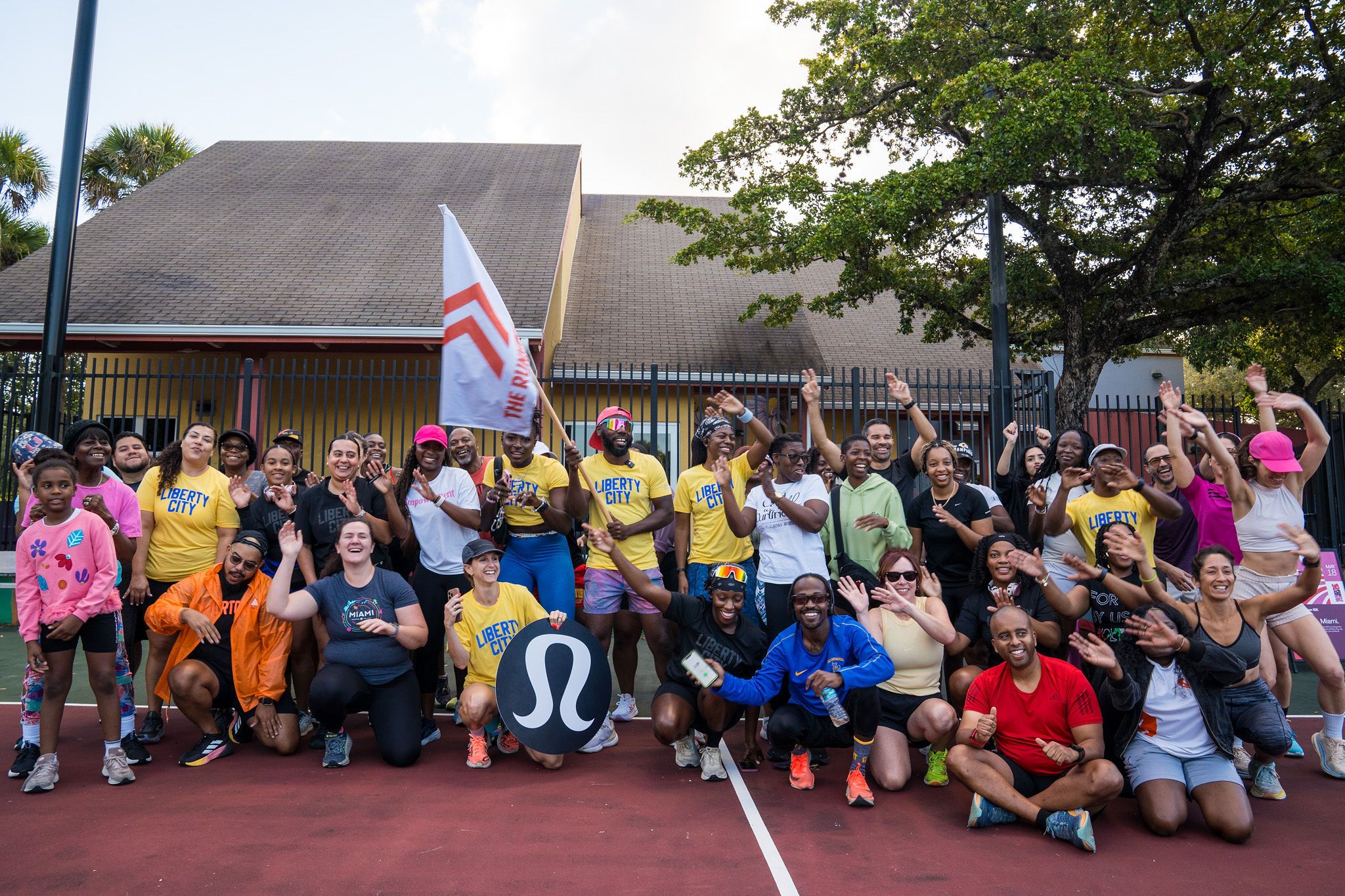 A group of runners posing for a photo.